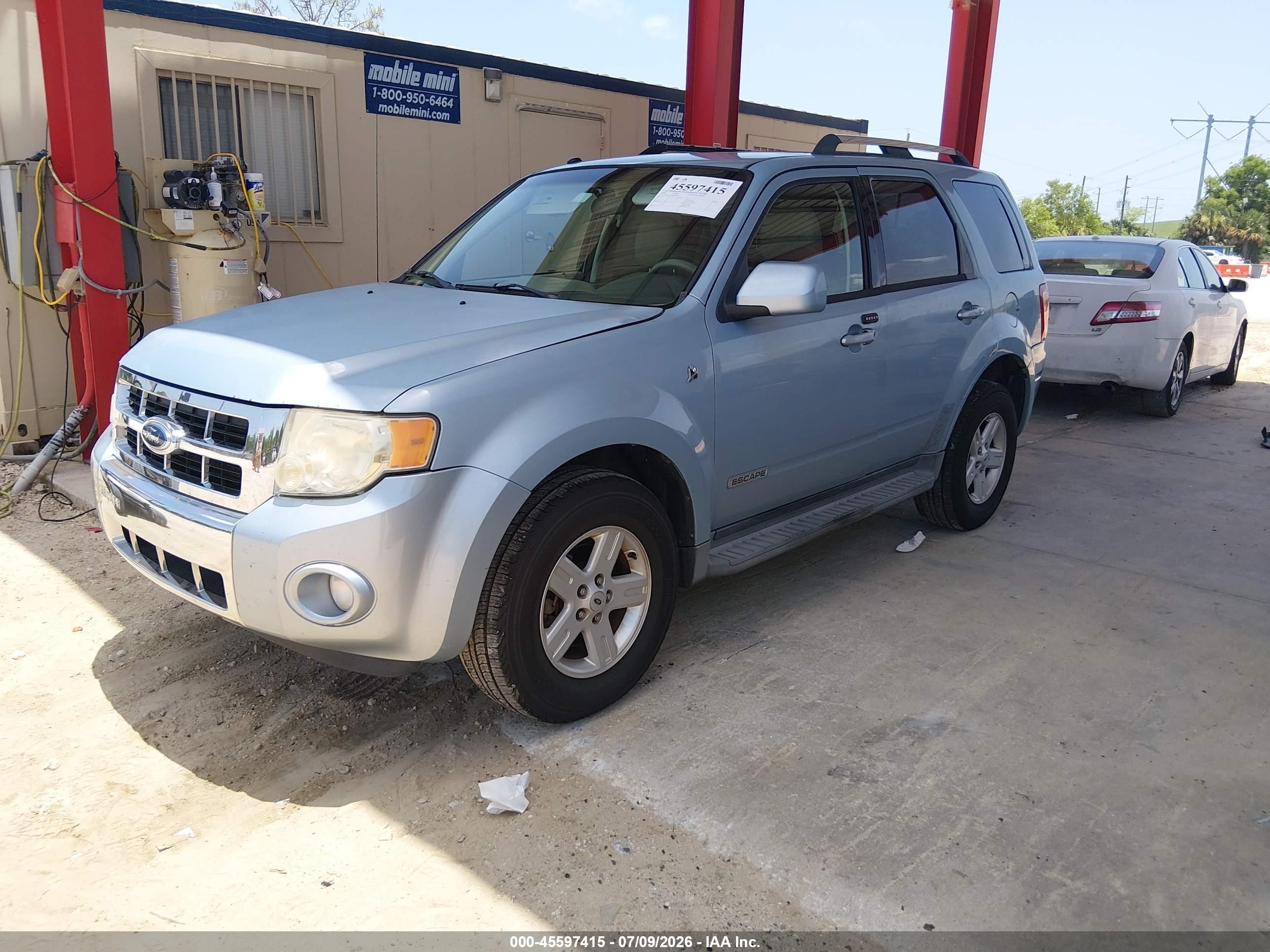 2008 Ford Escape Hybrid   Light Blue vin: 1FMCU49H38KB25149