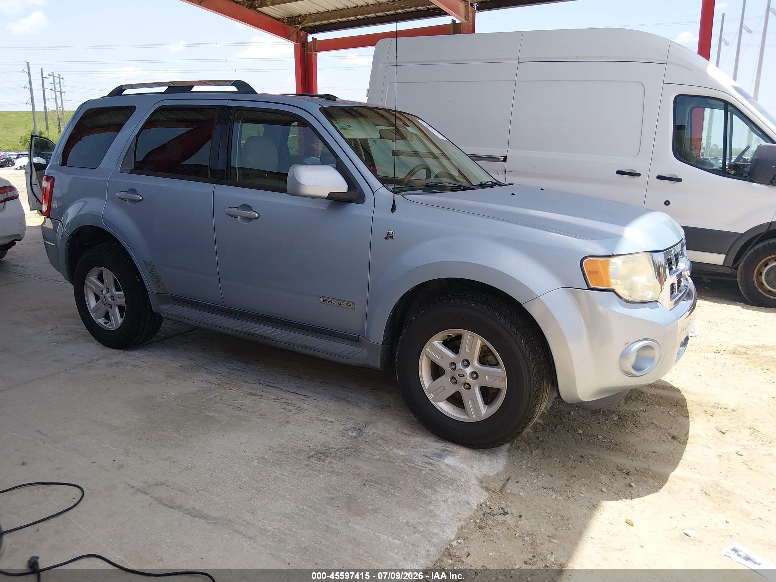 2008 Ford Escape Hybrid   Light Blue vin: 1FMCU49H38KB25149