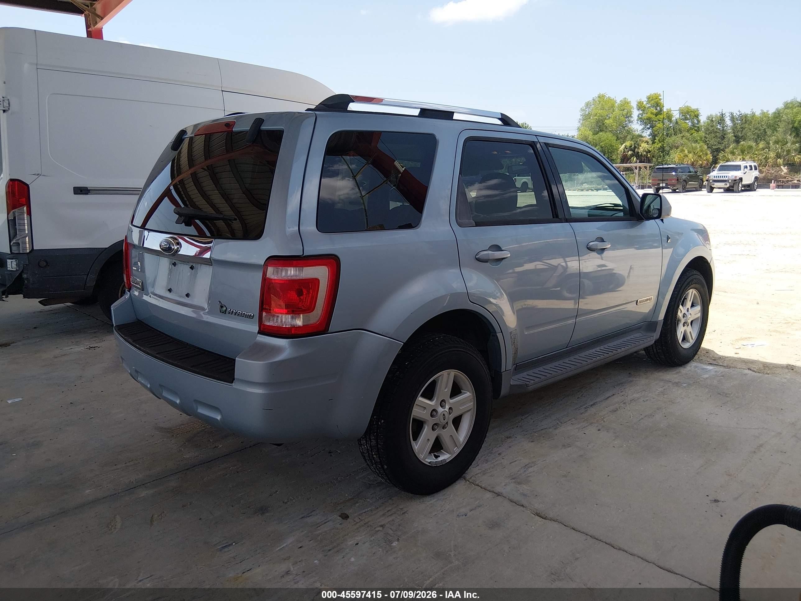 2008 Ford Escape Hybrid   Light Blue vin: 1FMCU49H38KB25149