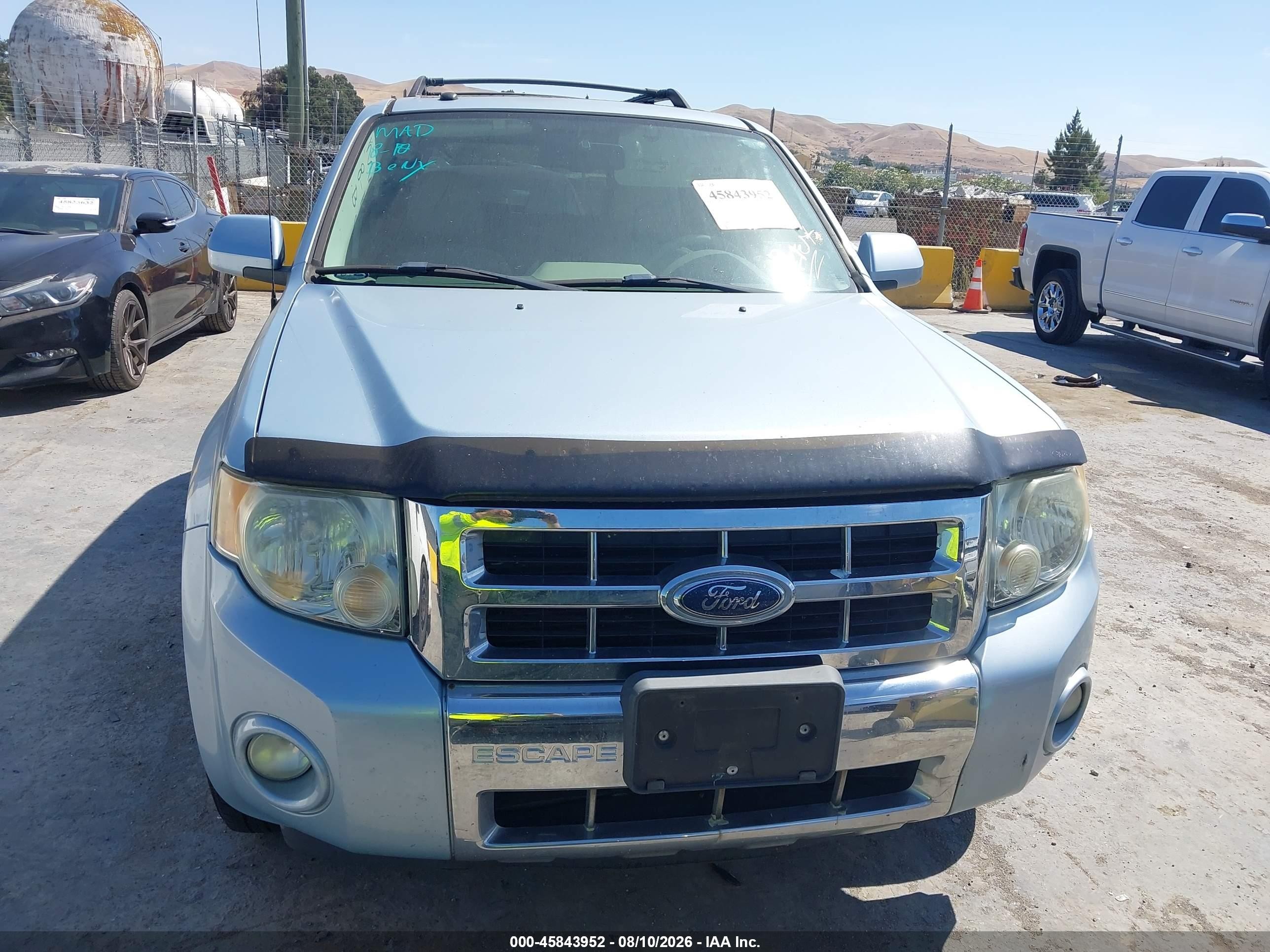 2008 Ford Escape Hybrid   Light Blue vin: 1FMCU49HX8KD32444