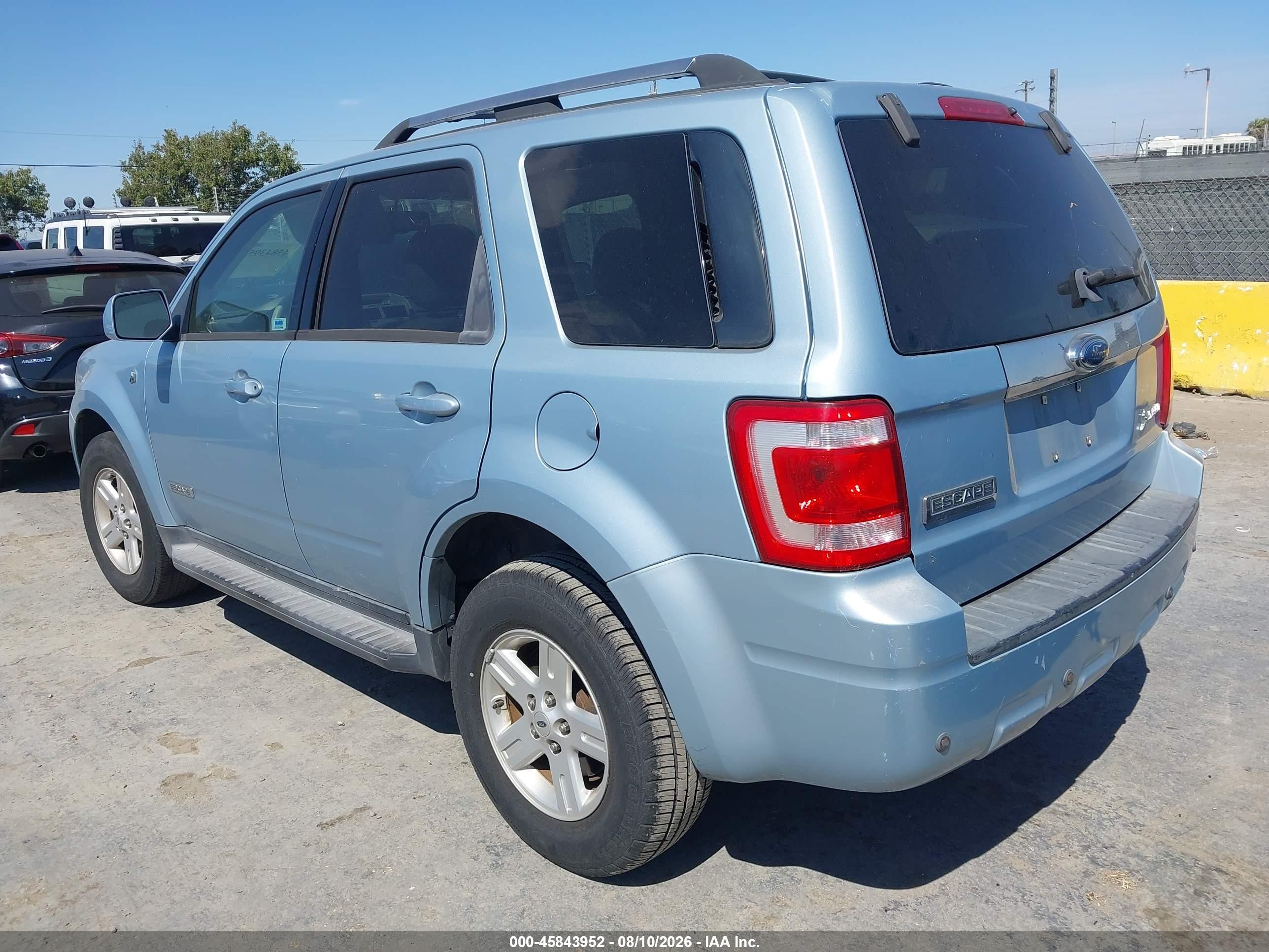 2008 Ford Escape Hybrid   Light Blue vin: 1FMCU49HX8KD32444
