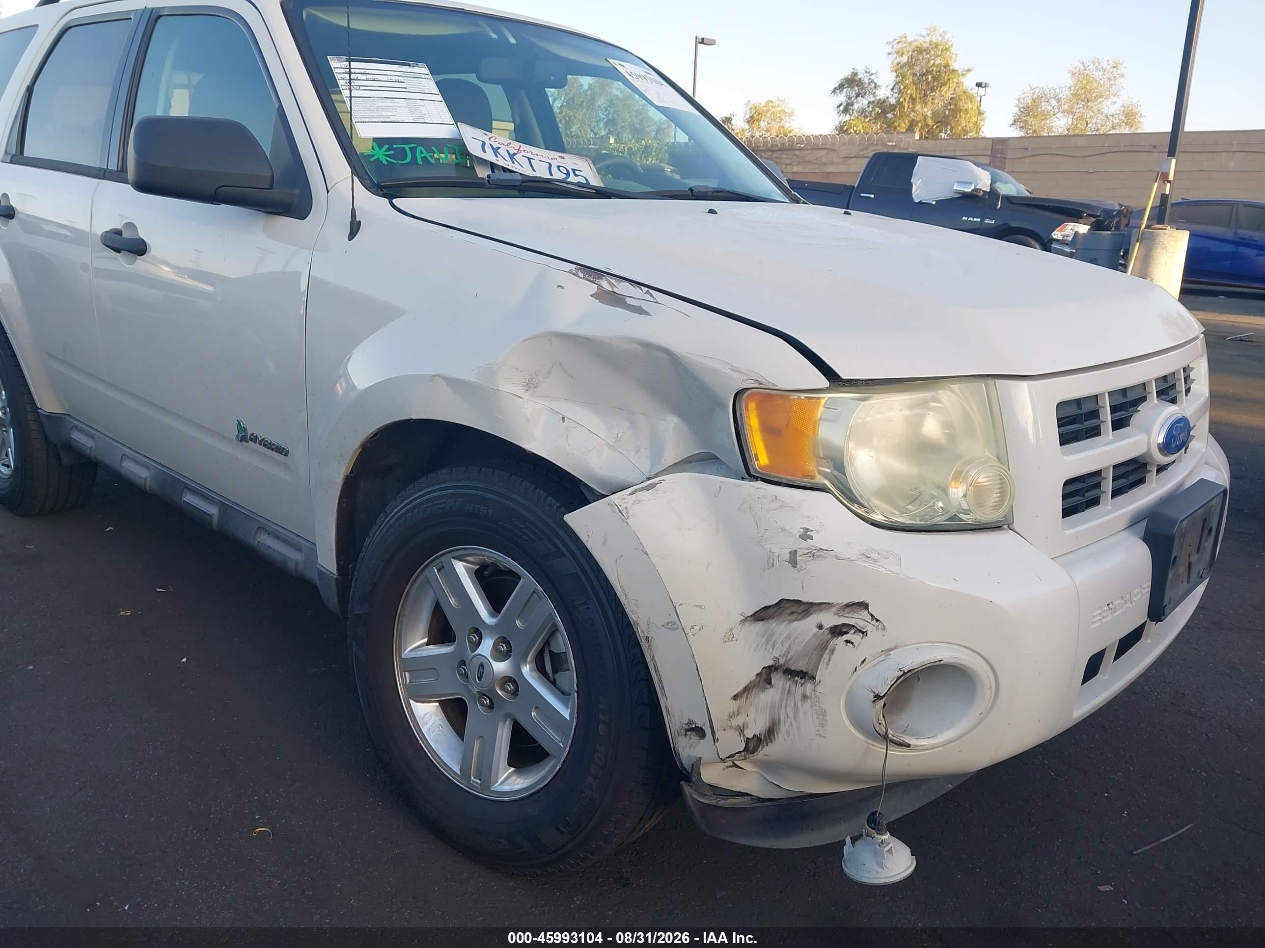 2011 Ford Escape Hybrid   White vin: 1FMCU4K37BKC63704