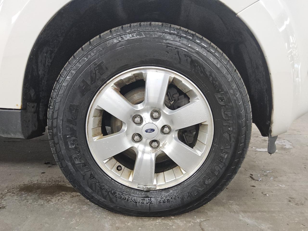 2010 Ford Escape Hybrid White vin: 1FMCU4K39AKC23915 Damage: Right Front Wheel, Curb Rash, 9 To 10 Inches