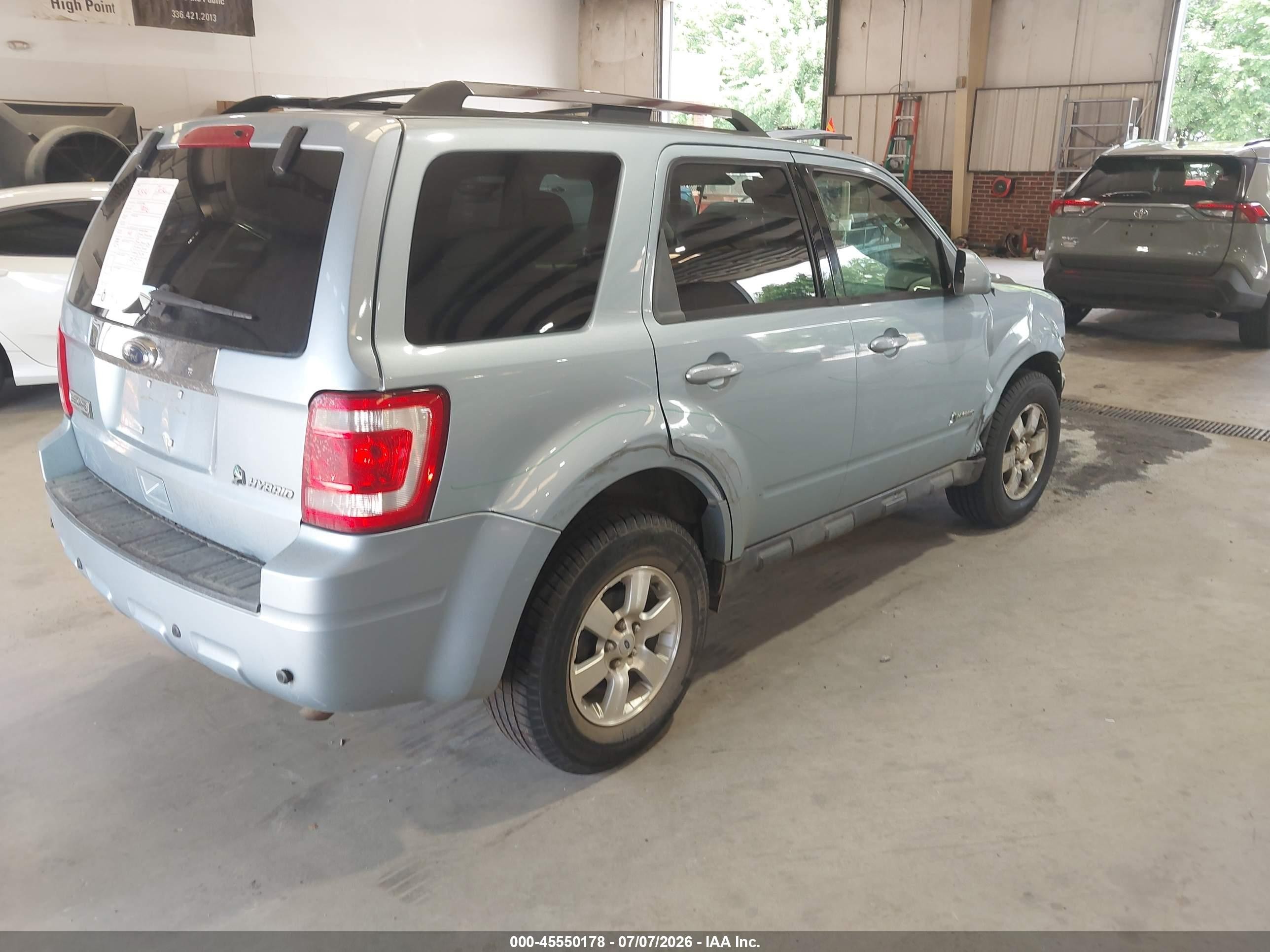 2009 Ford Escape Hybrid Limited Синий vin: 1FMCU59339KA24902