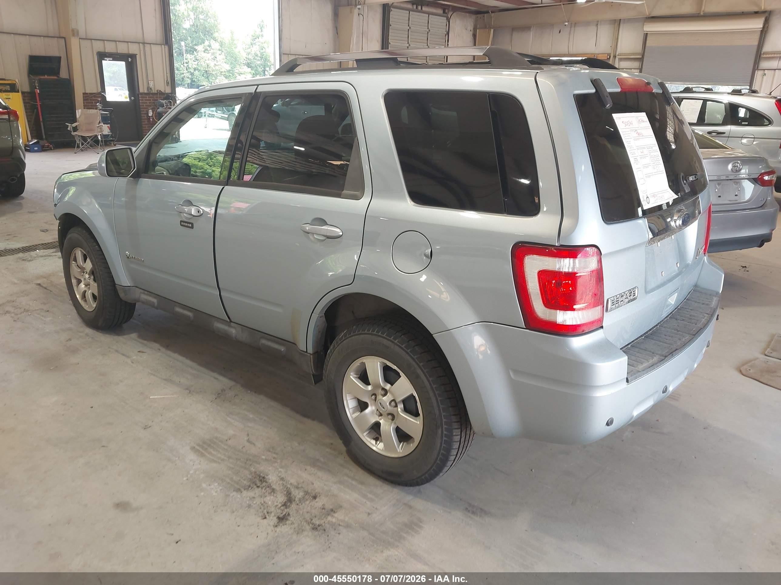 2009 Ford Escape Hybrid Limited Синий vin: 1FMCU59339KA24902