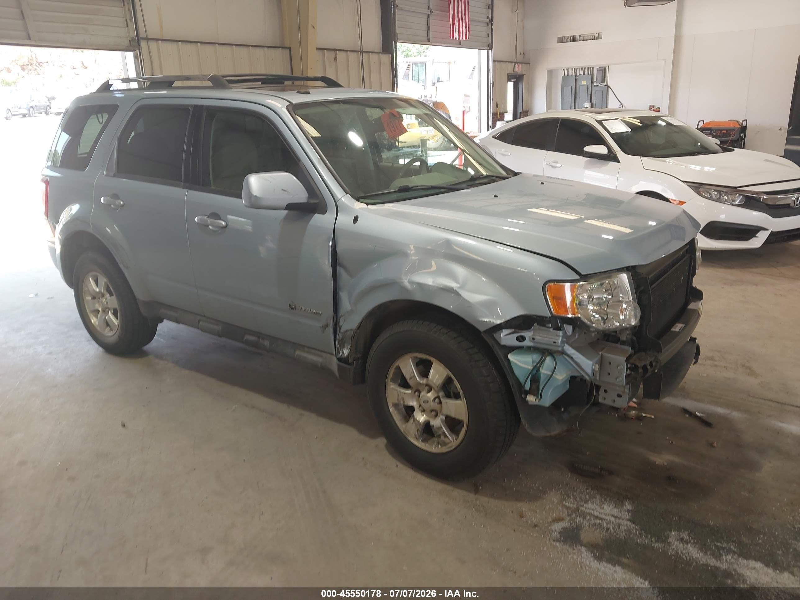 2009 Ford Escape Hybrid Limited Синий vin: 1FMCU59339KA24902