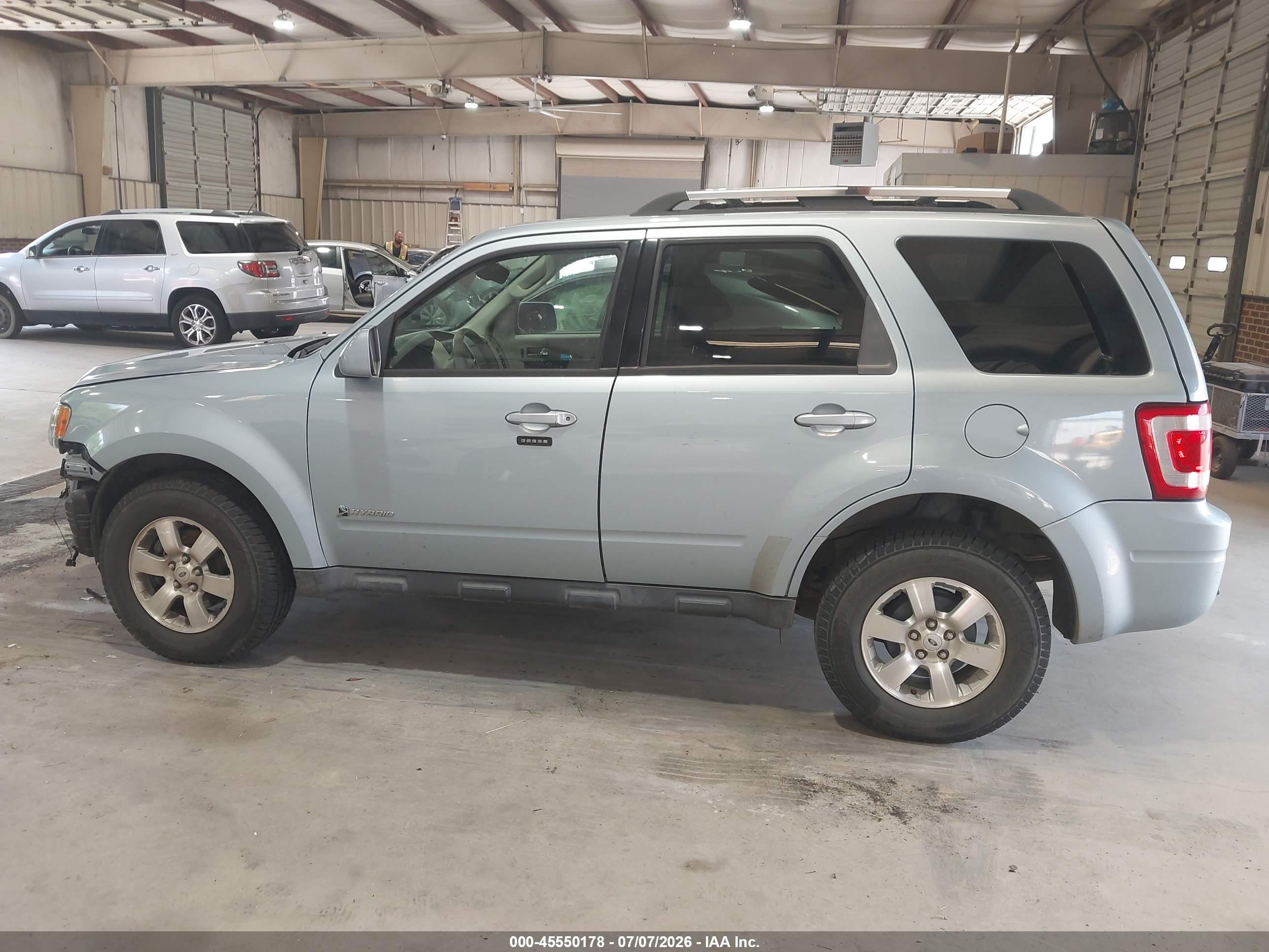 2009 Ford Escape Hybrid Limited Синий vin: 1FMCU59339KA24902