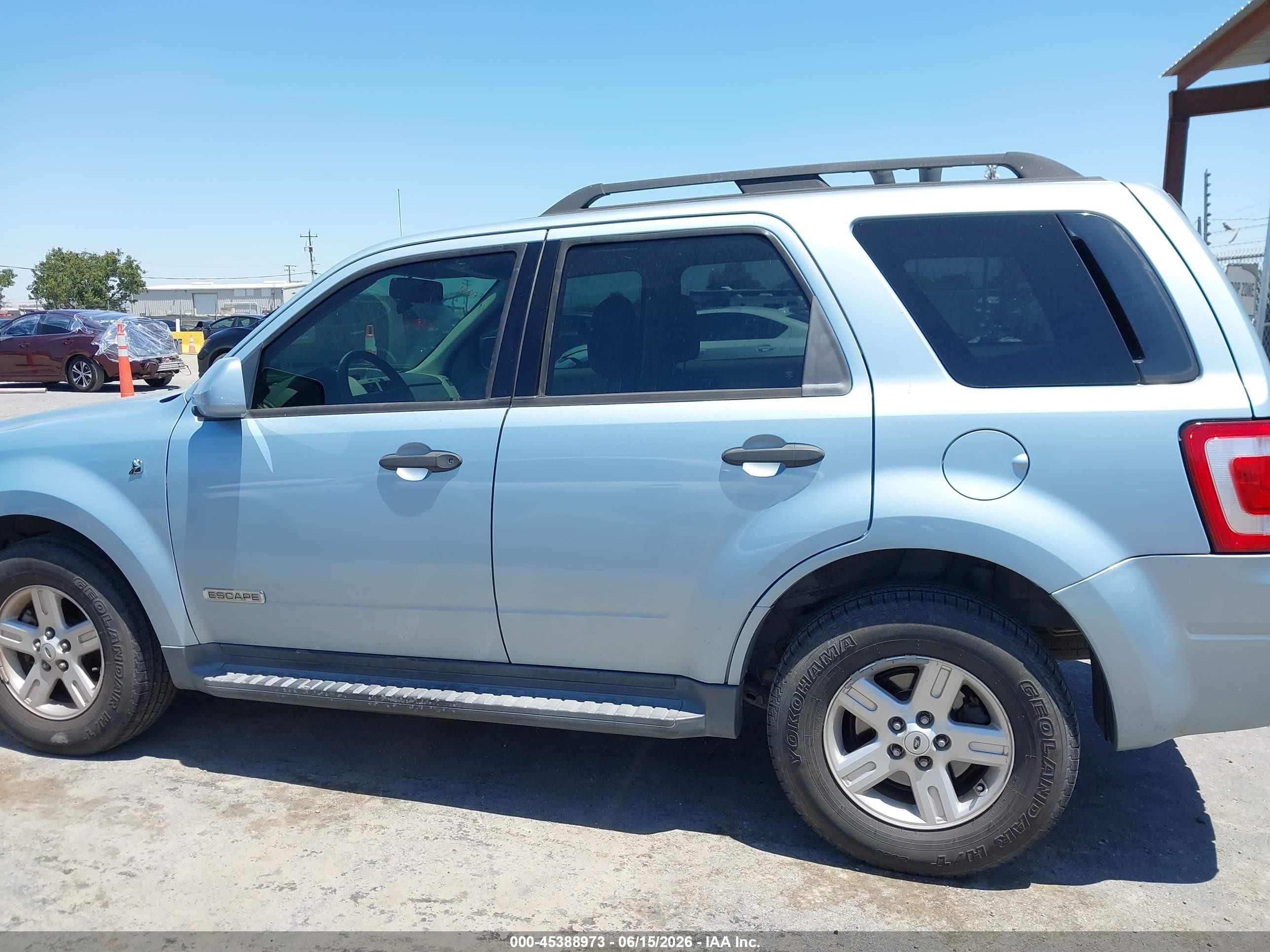 2008 Ford Escape Hybrid   Light Blue vin: 1FMCU59H88KB45354