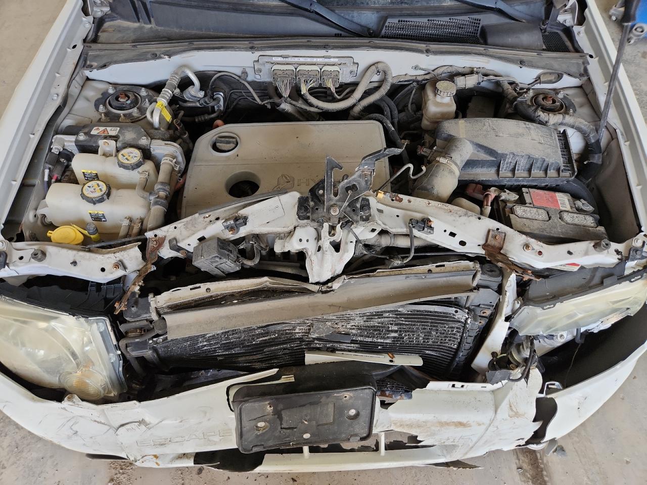 2011 Ford Escape Hybrid White vin: 1FMCU5K33BKB48877 Damage: Upper Tie Bar, Kinked, > 12 Inches