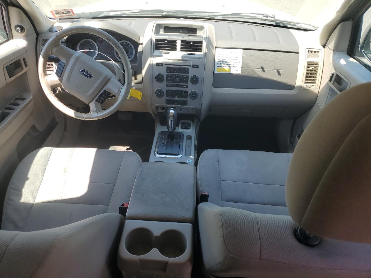 2011 Ford Escape Hybrid White vin: 1FMCU5K35BKB48850 Damage: Steering Wheel, Worn, Replacement Required
