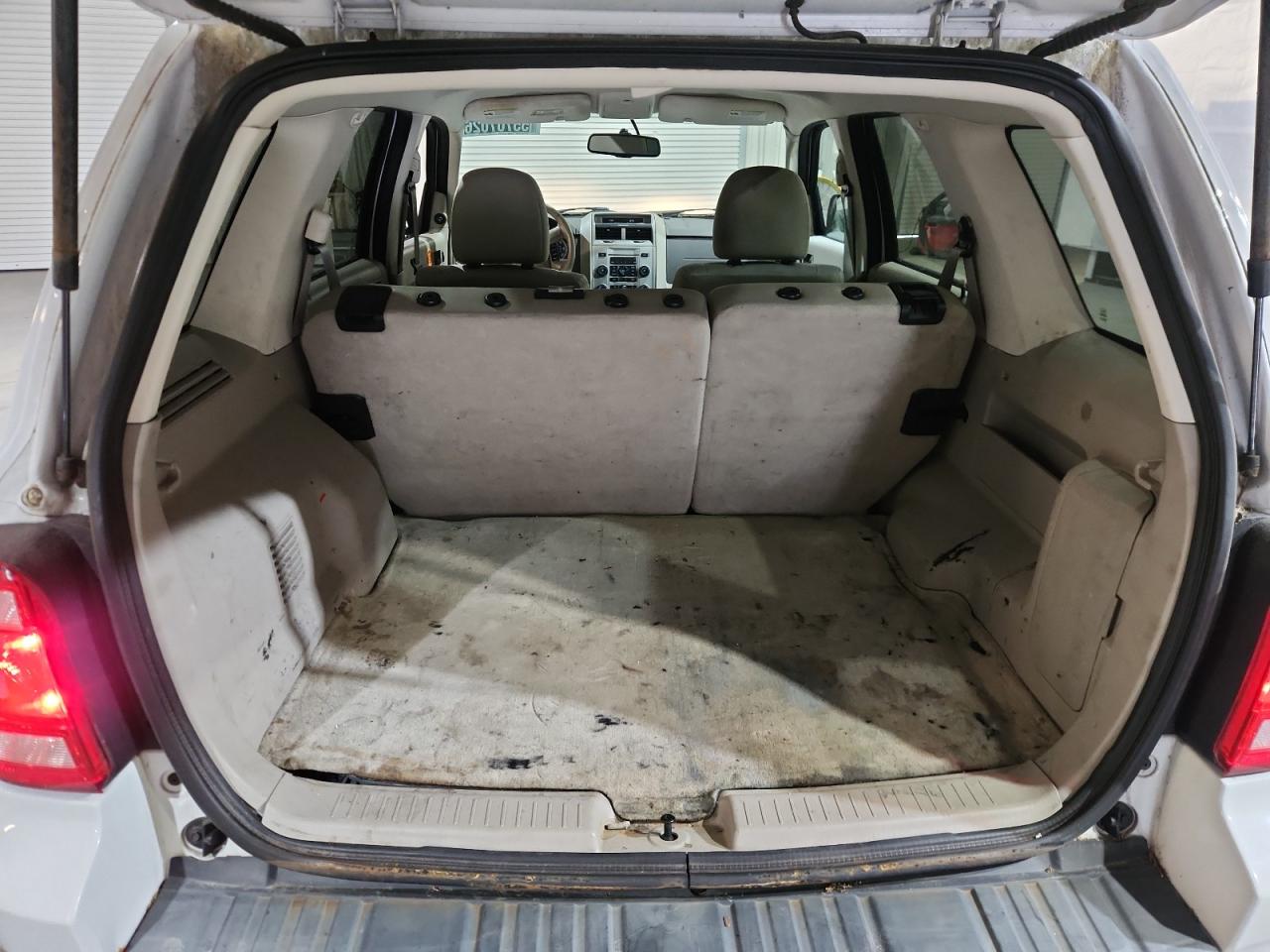 2011 Ford Escape Hybrid White vin: 1FMCU5K38BKB48812 Damage: Cargo Cover, Stained, Permanent