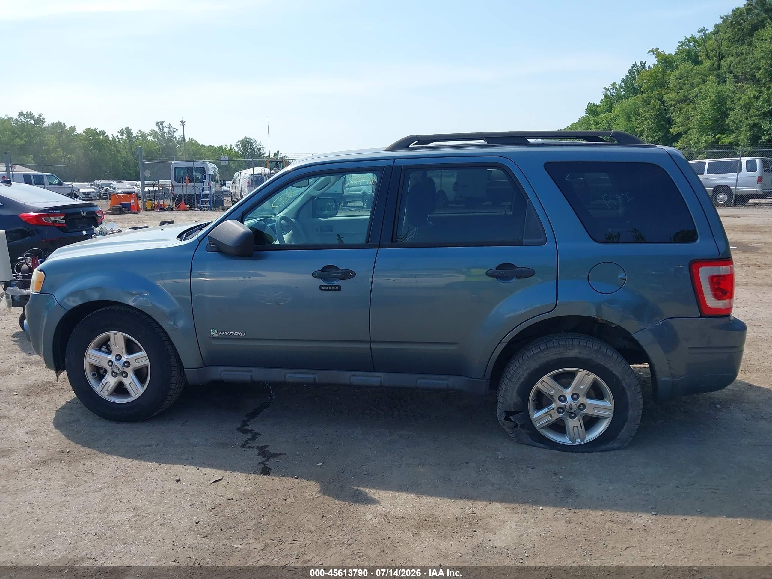 2011 Ford Escape Hybrid   Light Blue vin: 1FMCU5K3XBKC06435
