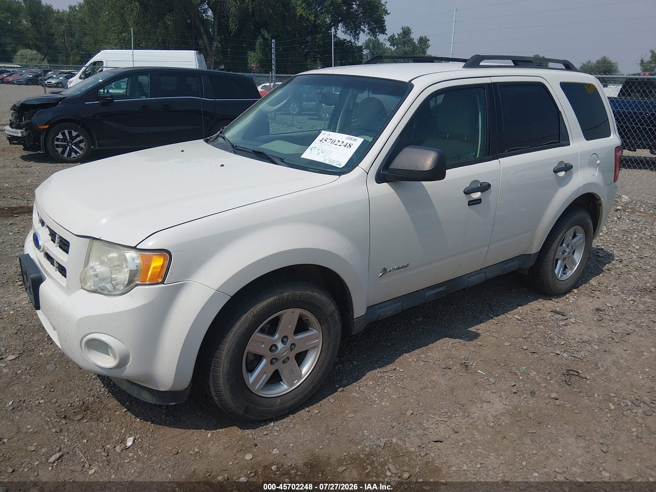 2011 Ford Escape Hybrid   White vin: 1FMCU5K3XBKC69583