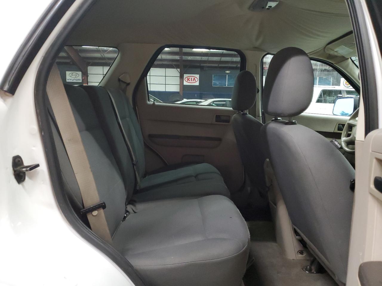 2008 Ford Escape Xls White vin: 1FMCU92Z18KB15946 Damage: Right Rear Seat Cushion, Burn Hole, < 1/8 Inch
