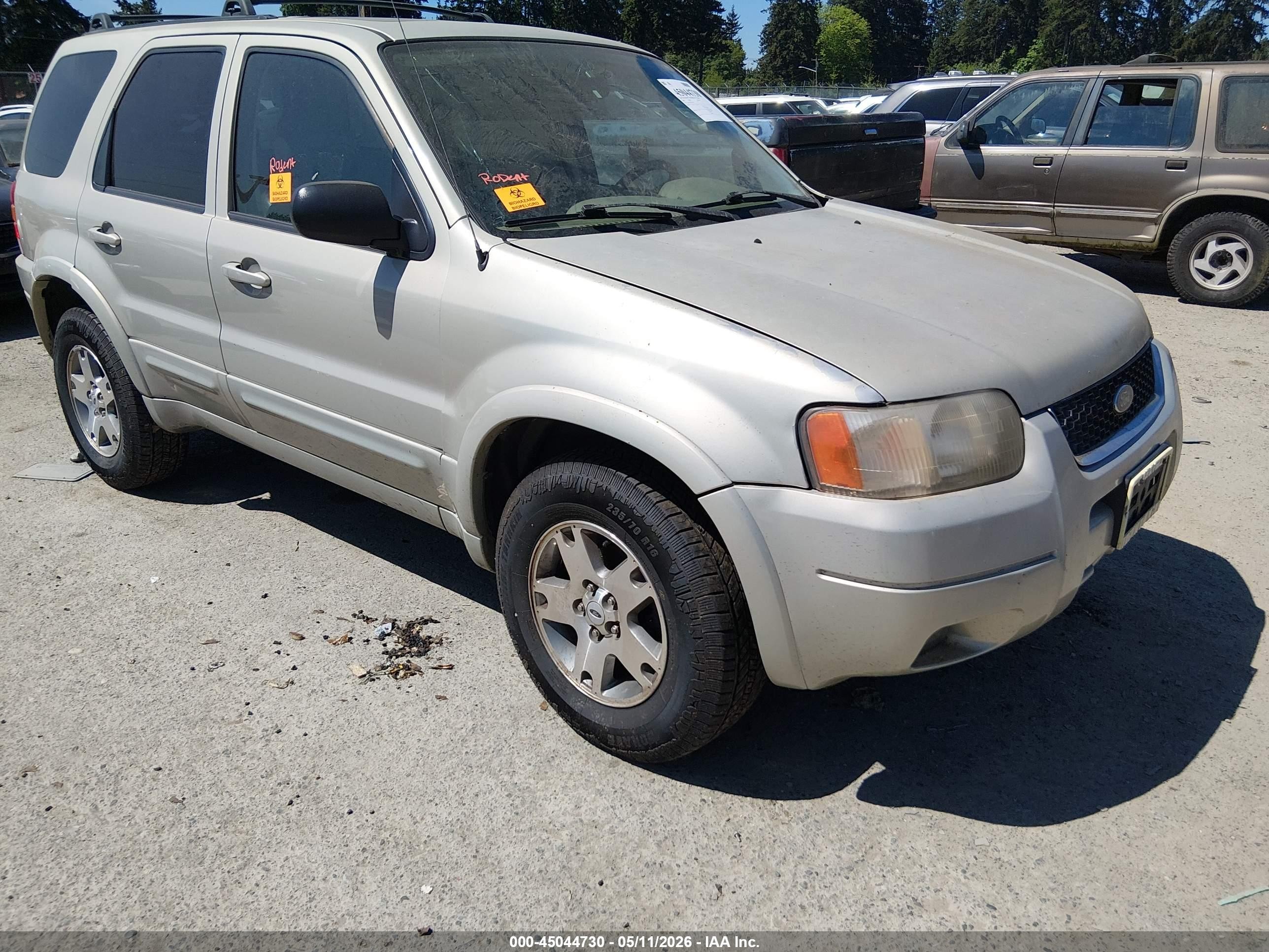2004 Ford Escape Limited Tan vin: 1FMCU94104KA63291