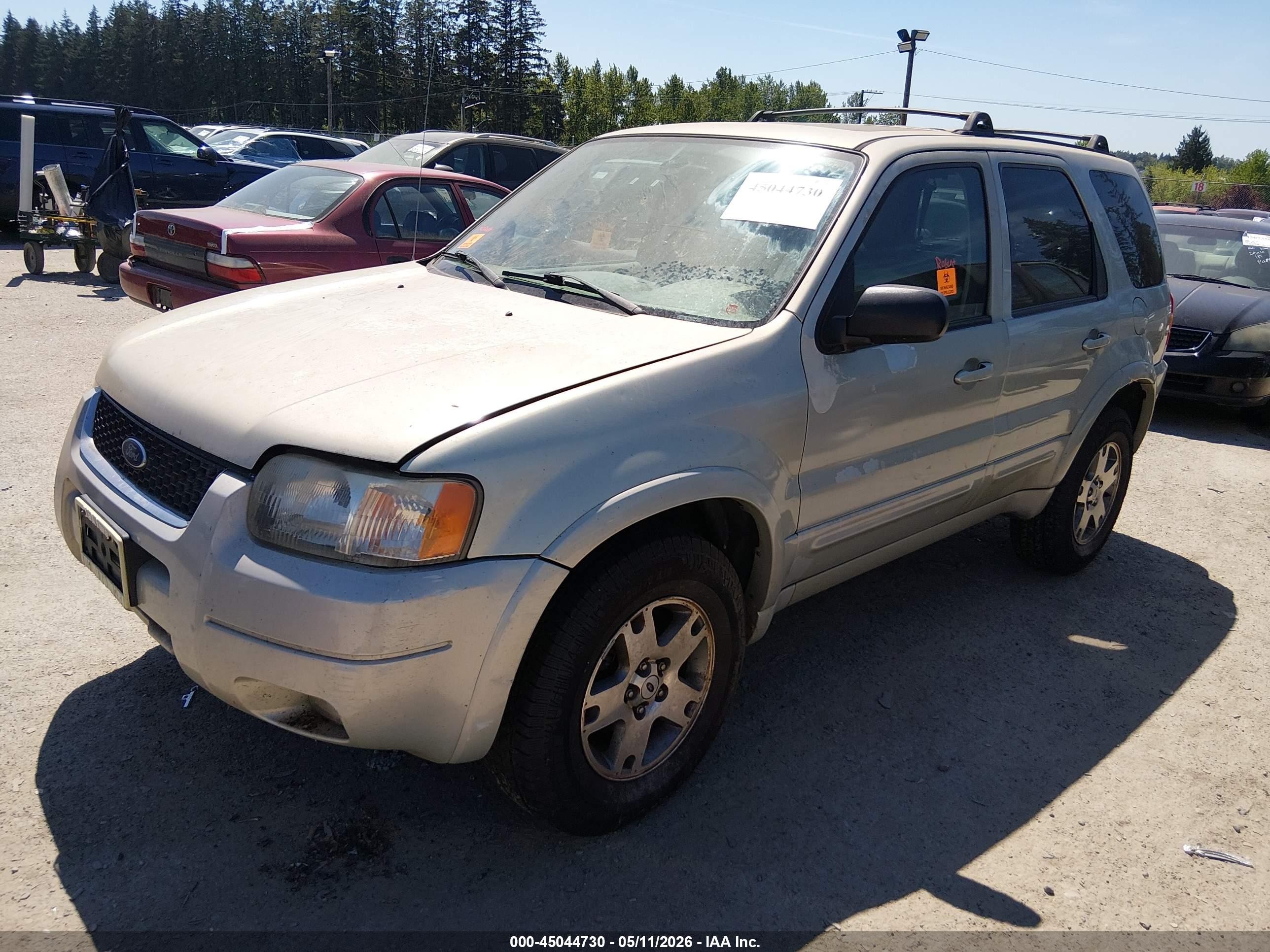 2004 Ford Escape Limited Tan vin: 1FMCU94104KA63291