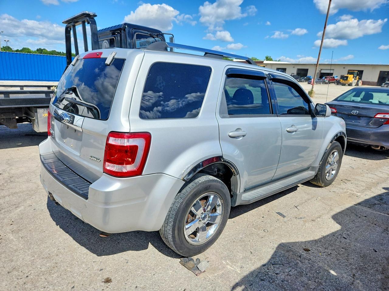 2009 Ford Escape Limited Серебряный vin: 1FMCU94G39KA62342