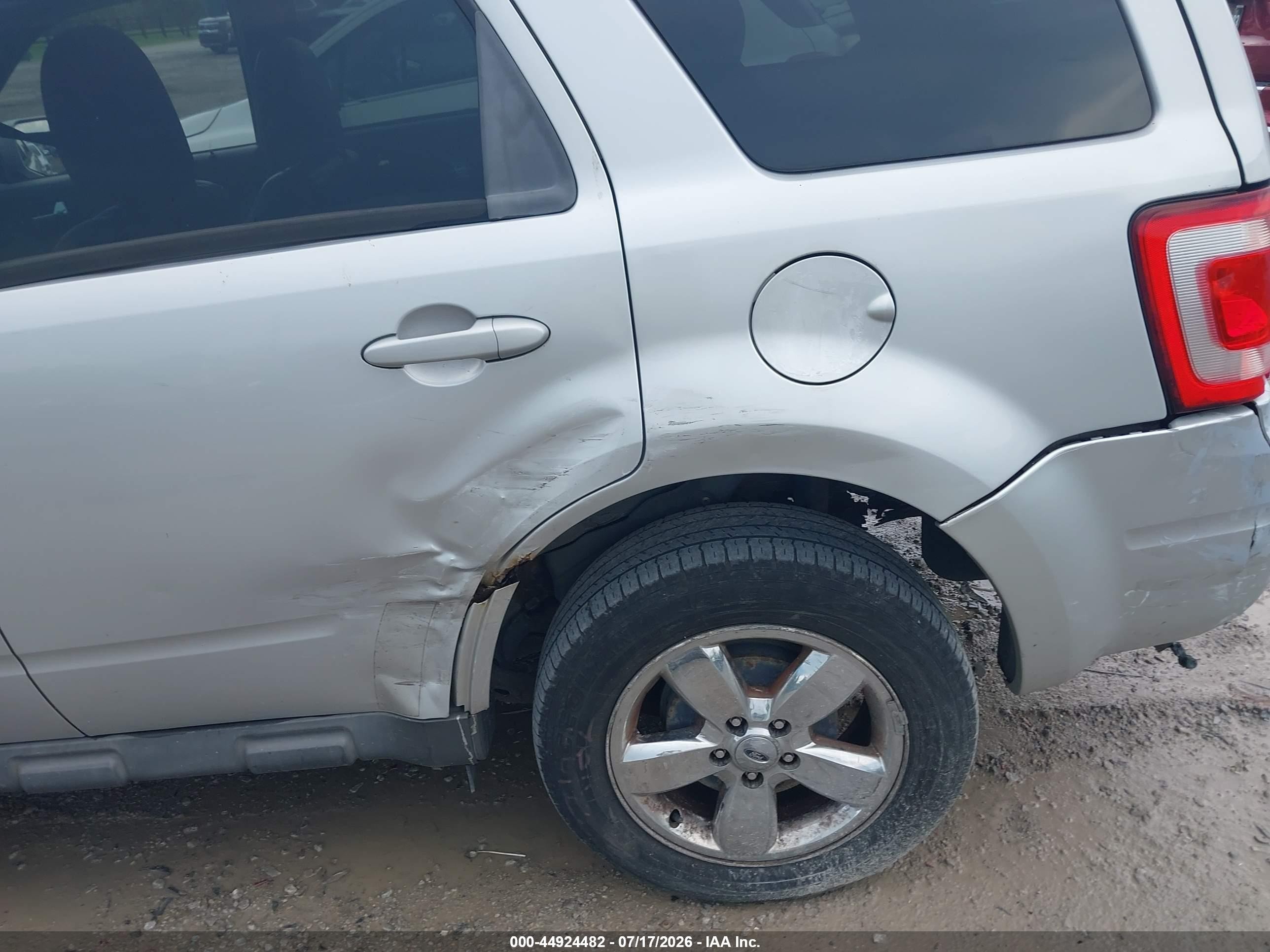 2009 Ford Escape Limited Серебряный vin: 1FMCU94G39KA92358