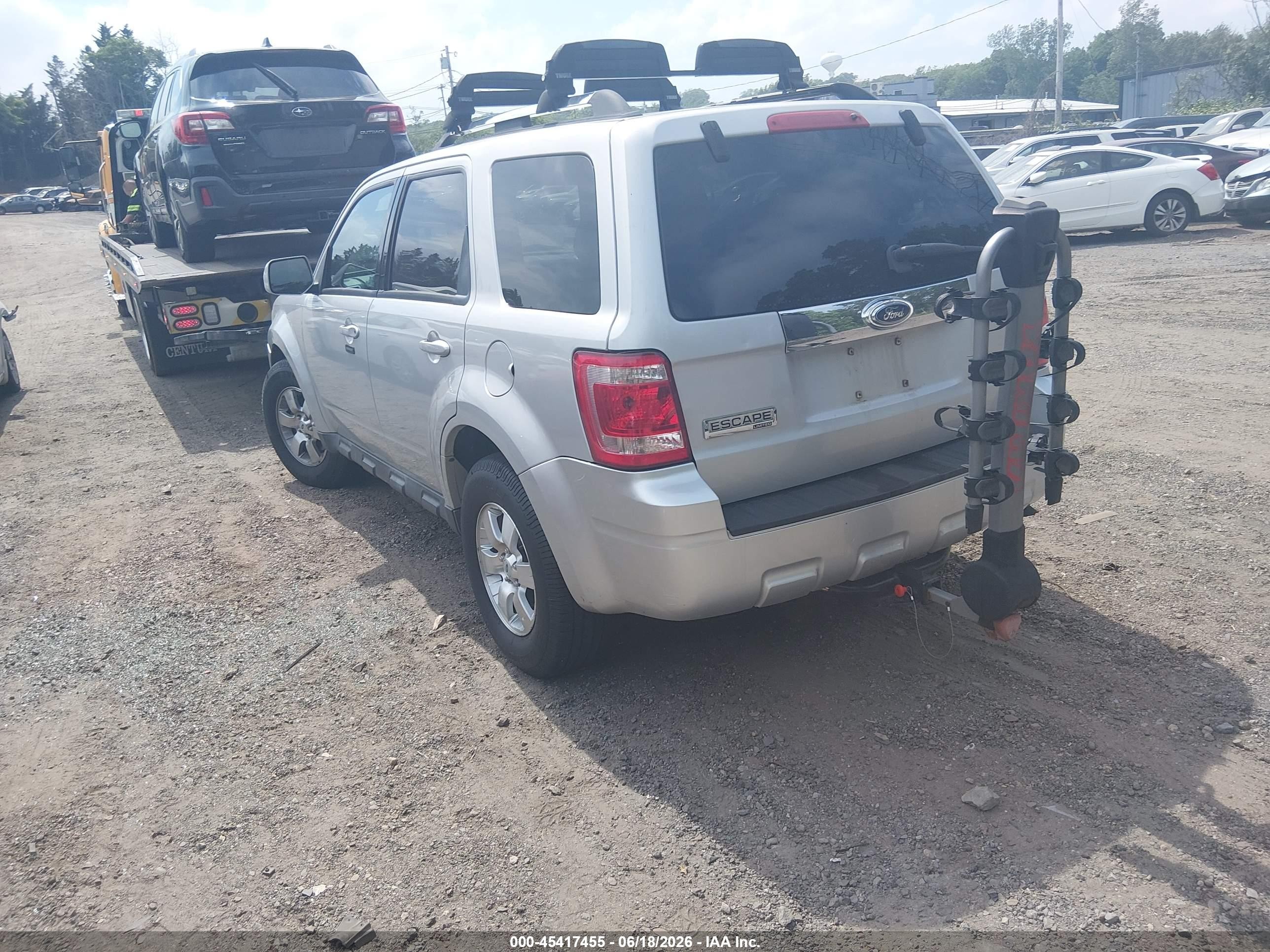 2009 Ford Escape Limited Серебряный vin: 1FMCU94G69KC56508
