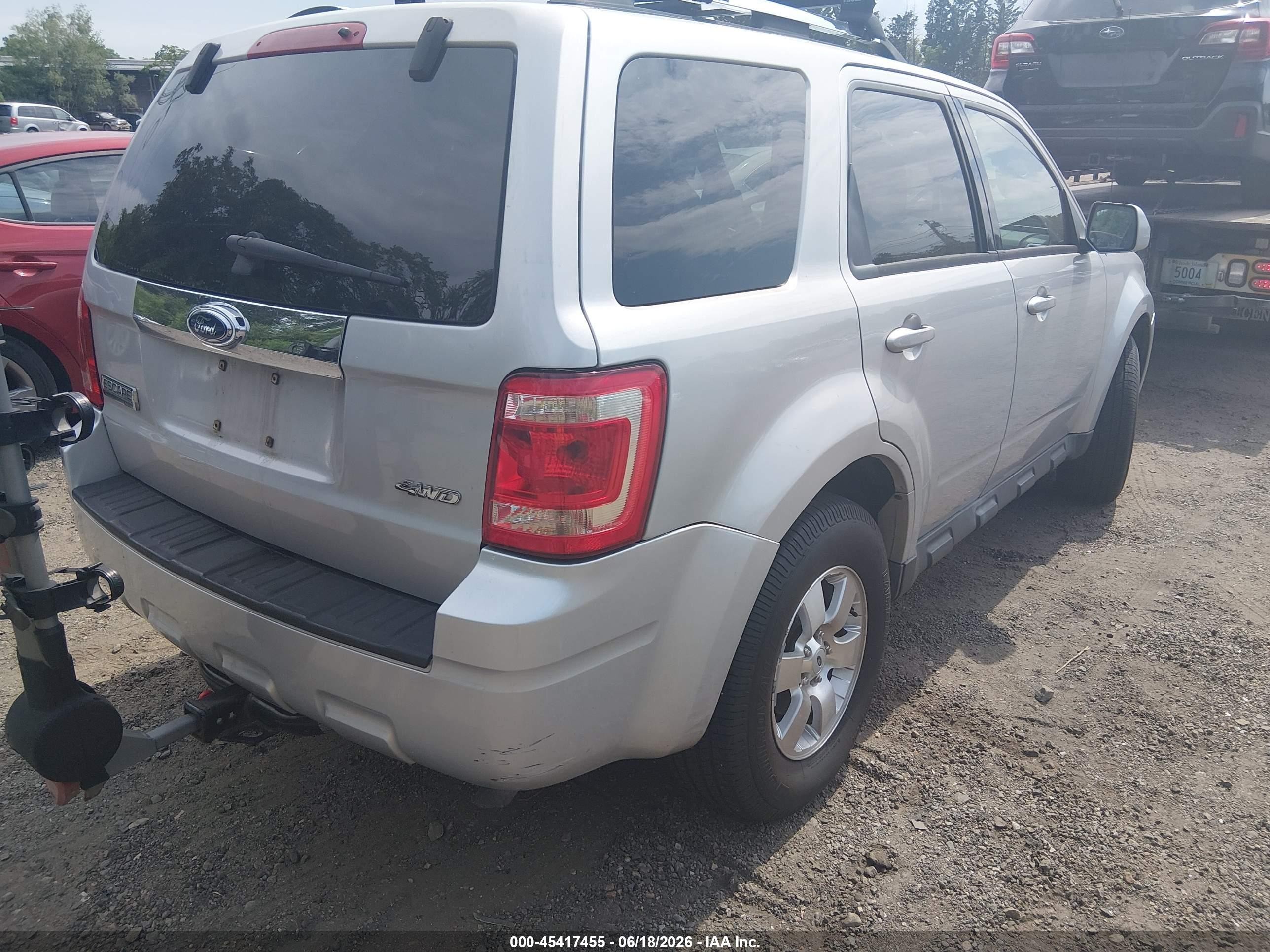 2009 Ford Escape Limited Серебряный vin: 1FMCU94G69KC56508