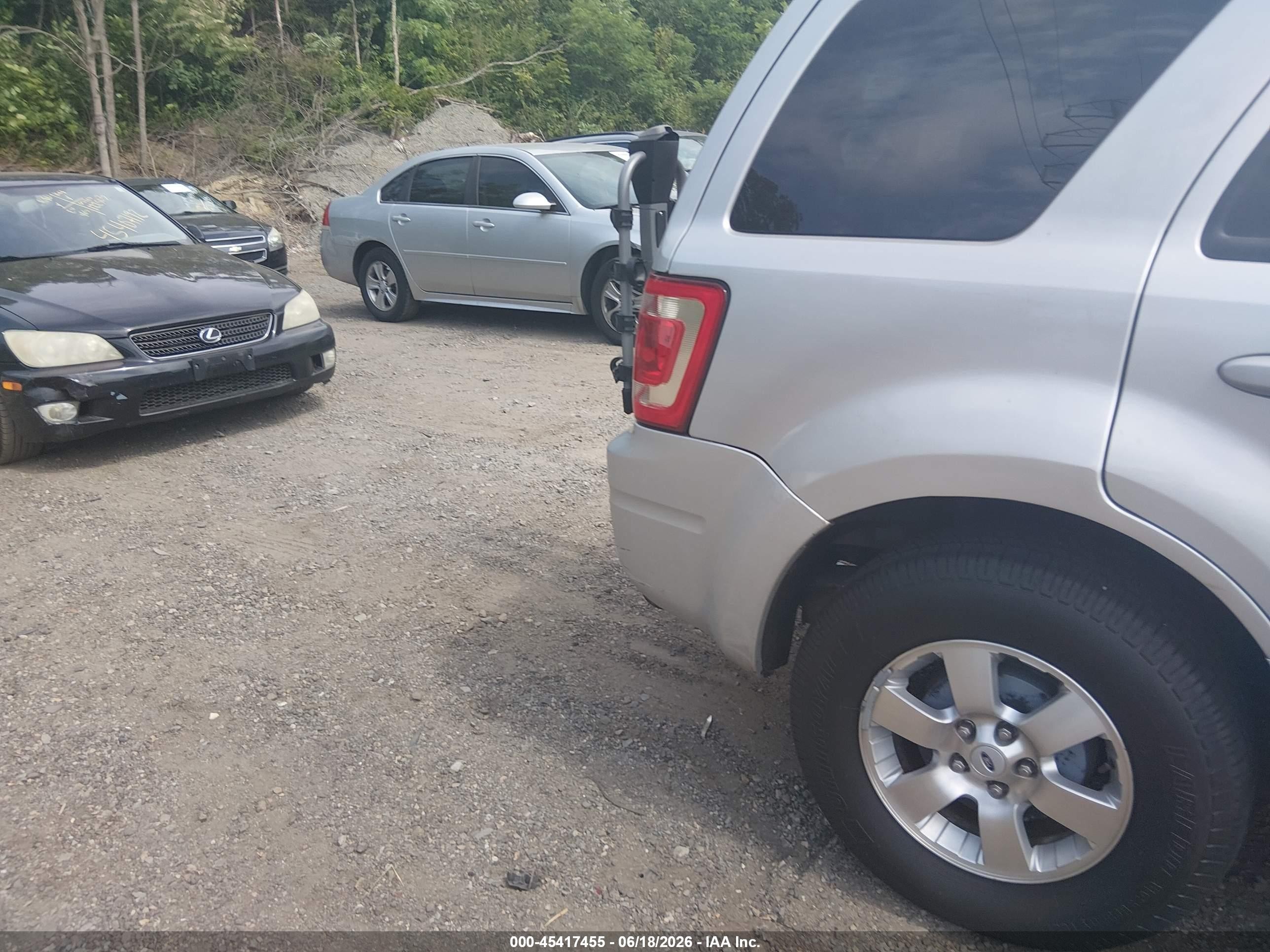 2009 Ford Escape Limited Серебряный vin: 1FMCU94G69KC56508