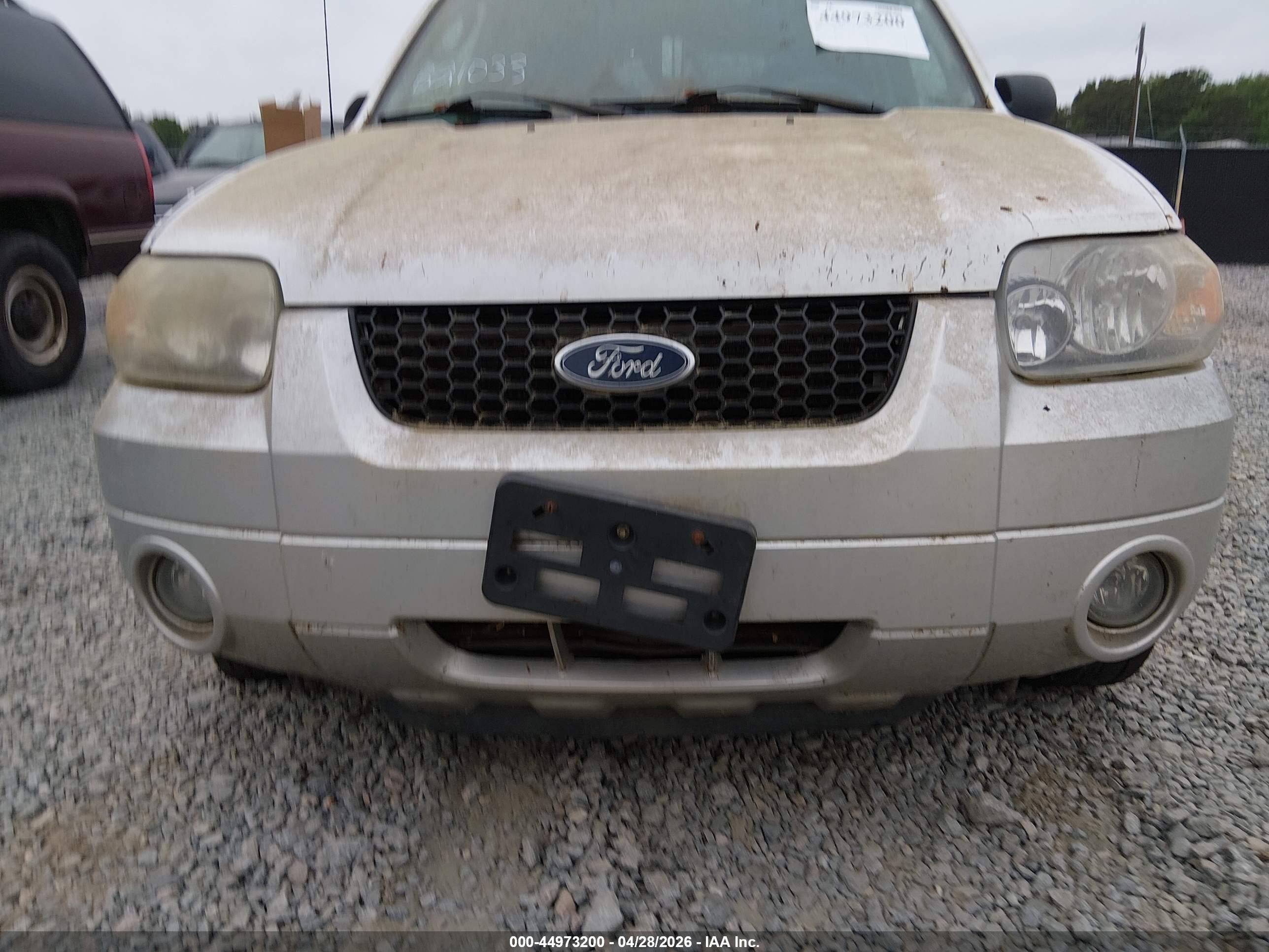 2006 Ford Escape Hybrid   White vin: 1FMCU95H86KB21033