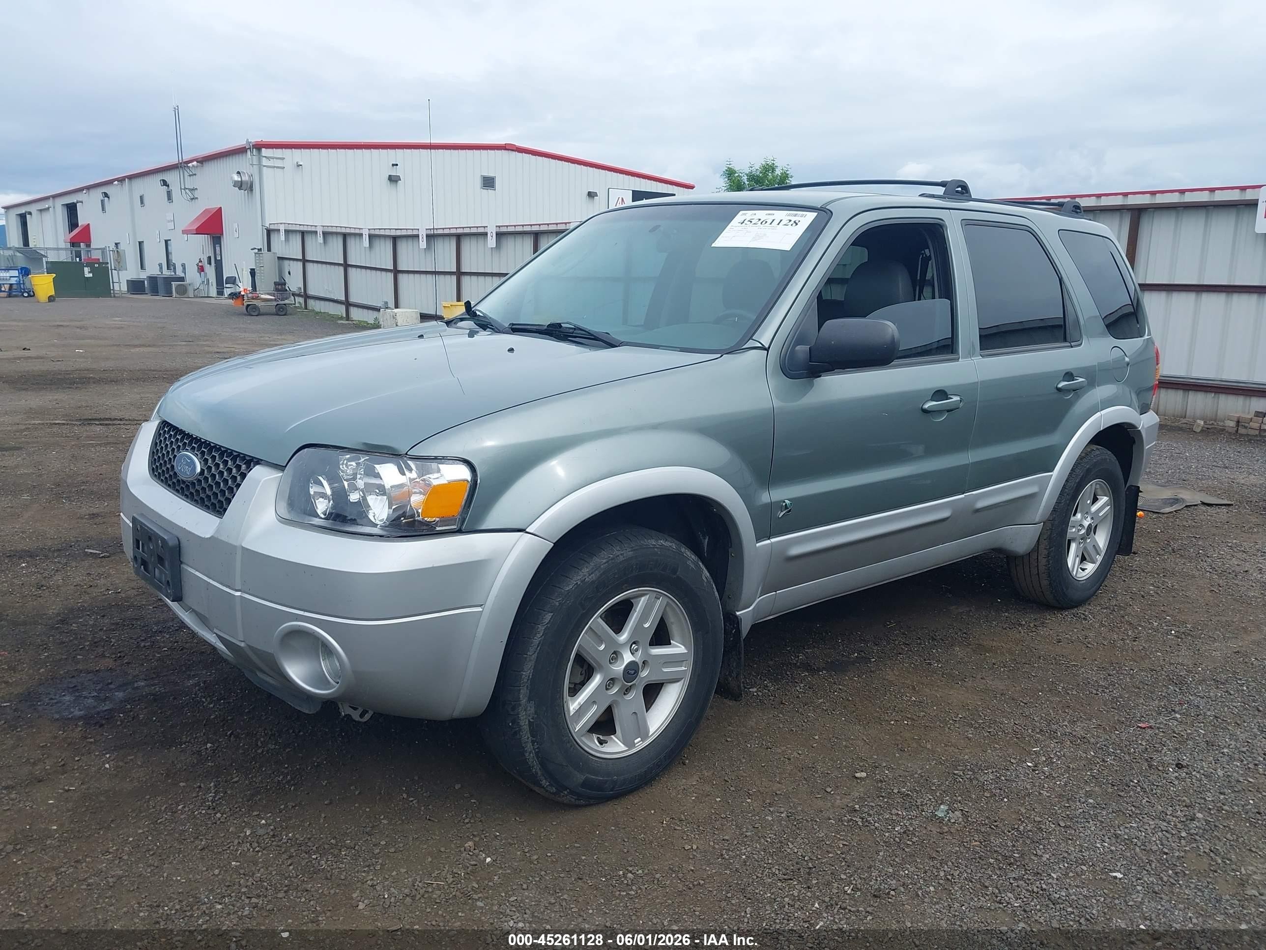 2006 Ford Escape Hybrid   Light Blue vin: 1FMCU96H86KC27948