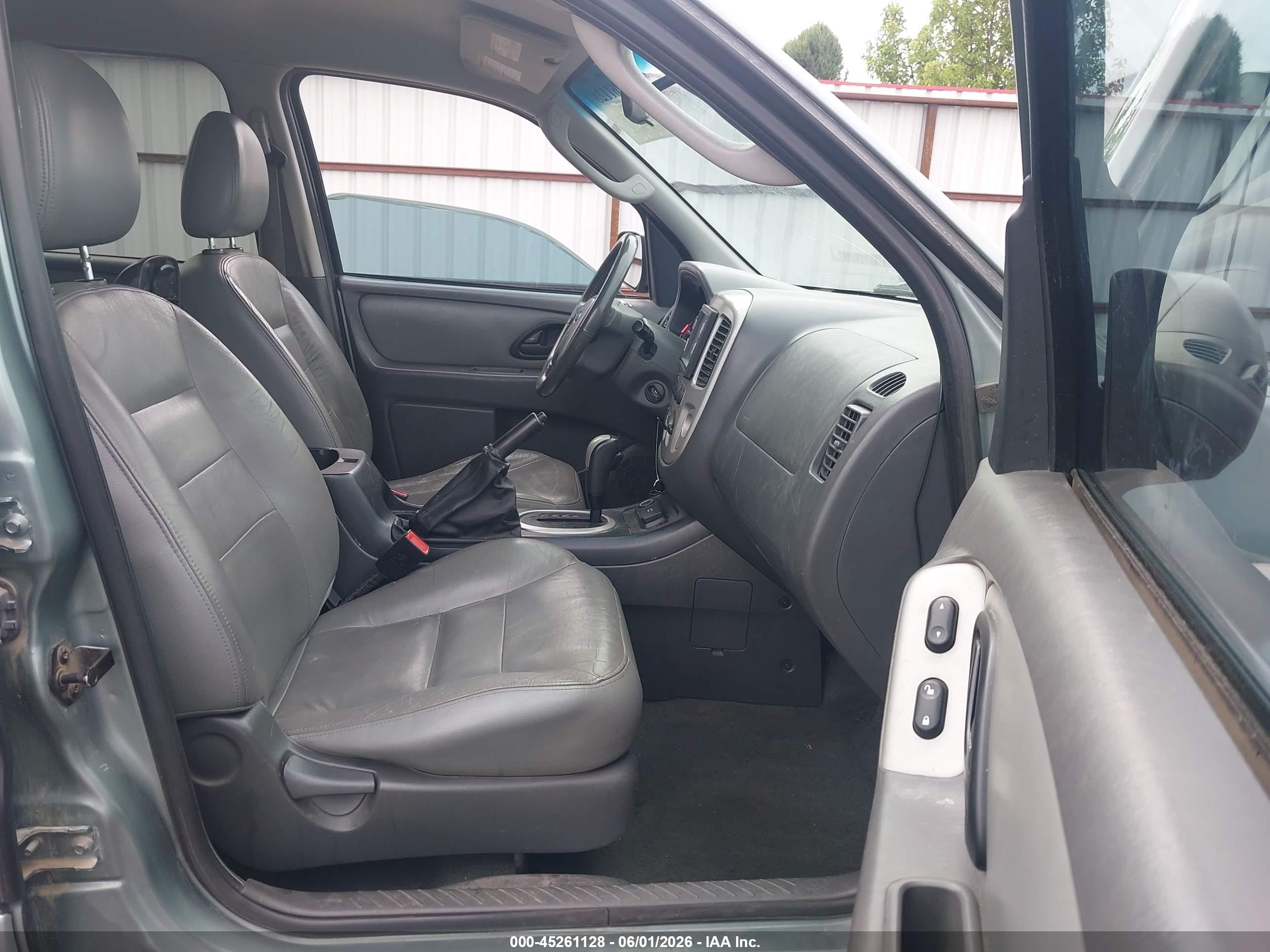2006 Ford Escape Hybrid   Light Blue vin: 1FMCU96H86KC27948