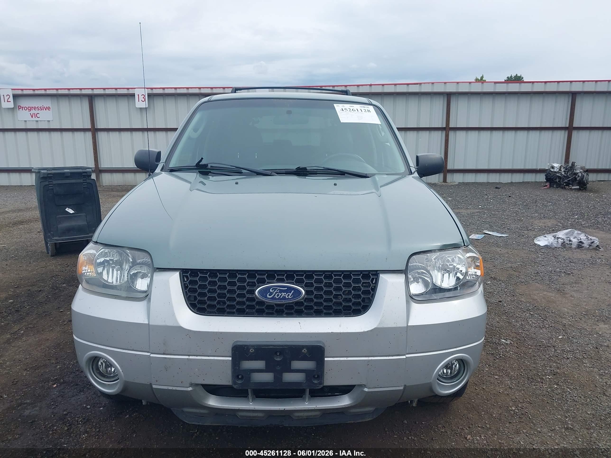 2006 Ford Escape Hybrid   Light Blue vin: 1FMCU96H86KC27948