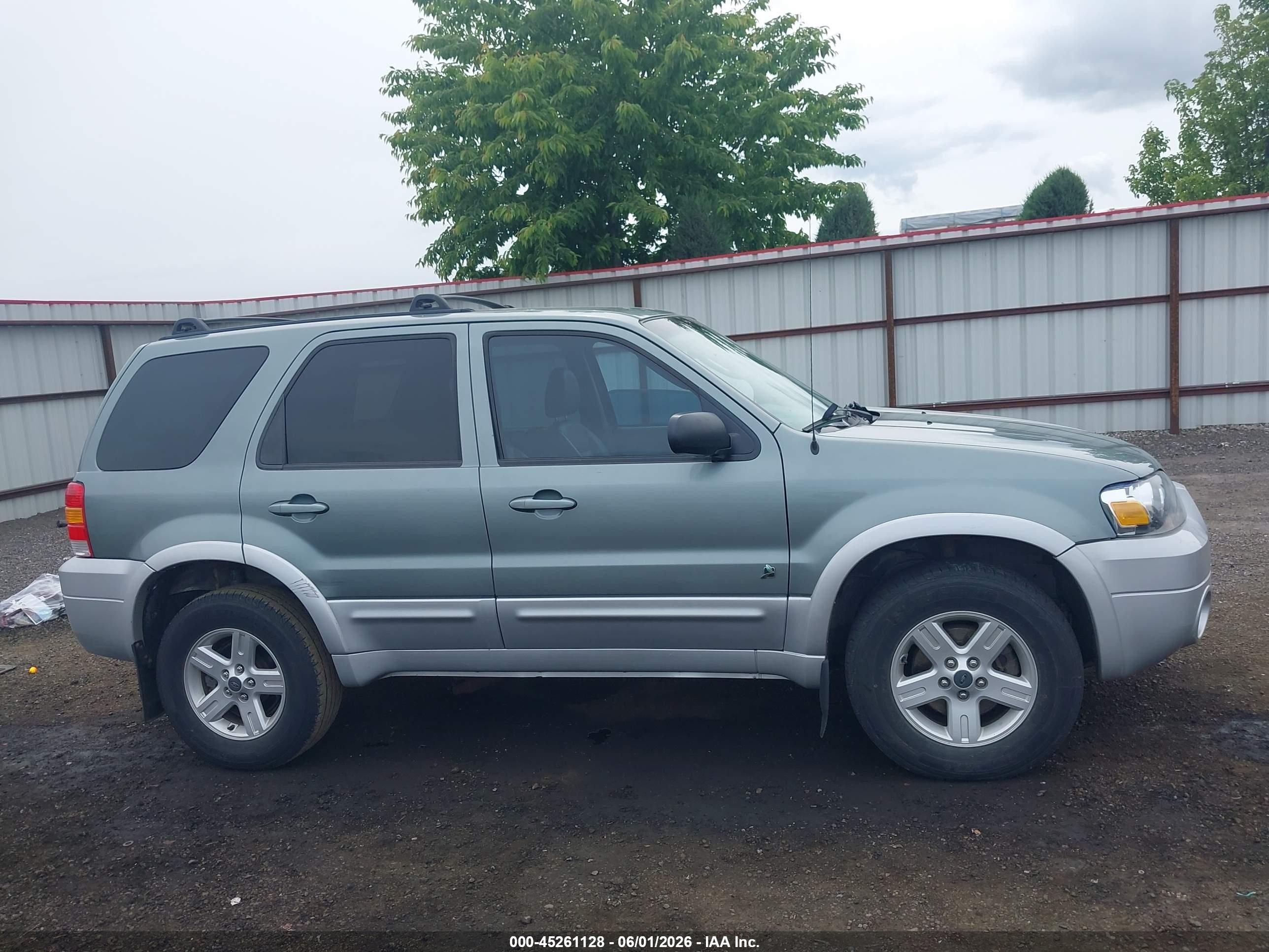 2006 Ford Escape Hybrid   Light Blue vin: 1FMCU96H86KC27948