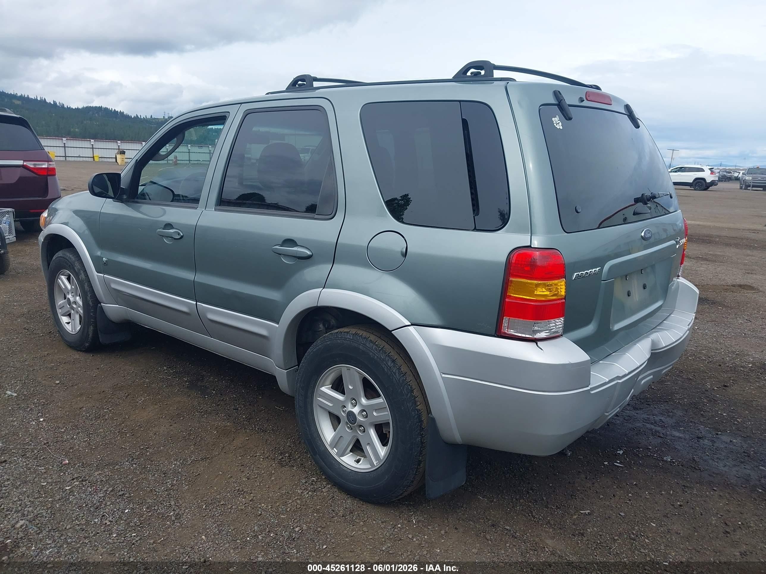 2006 Ford Escape Hybrid   Light Blue vin: 1FMCU96H86KC27948