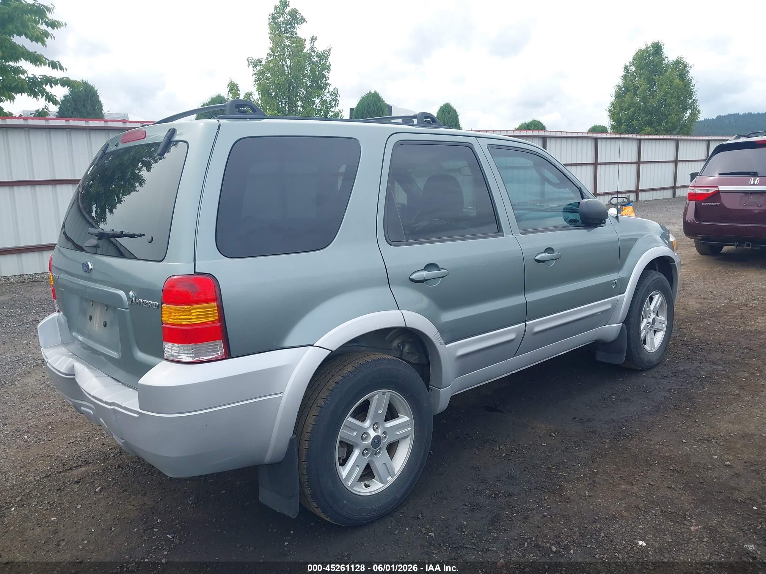 2006 Ford Escape Hybrid   Light Blue vin: 1FMCU96H86KC27948