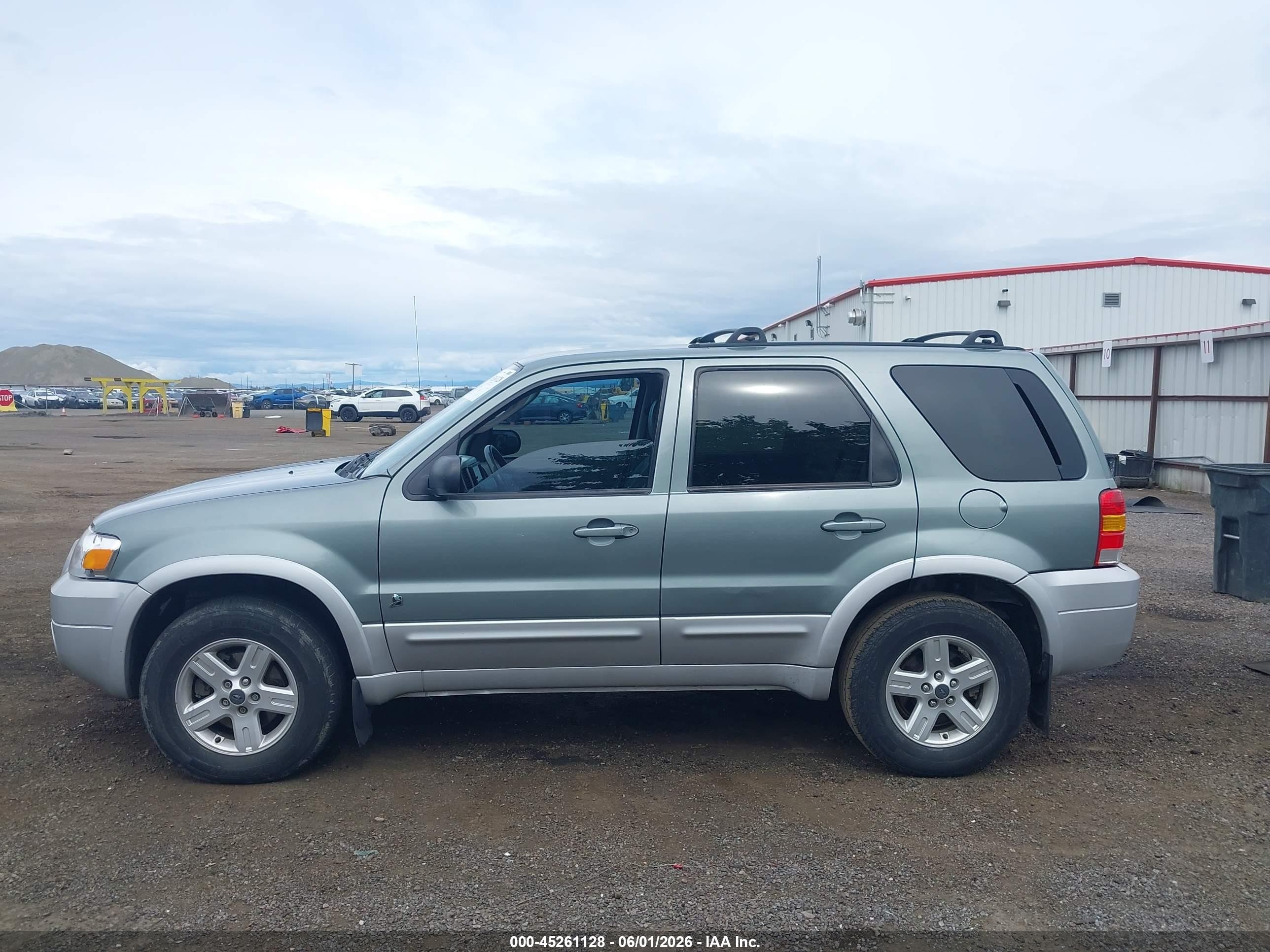 2006 Ford Escape Hybrid   Light Blue vin: 1FMCU96H86KC27948