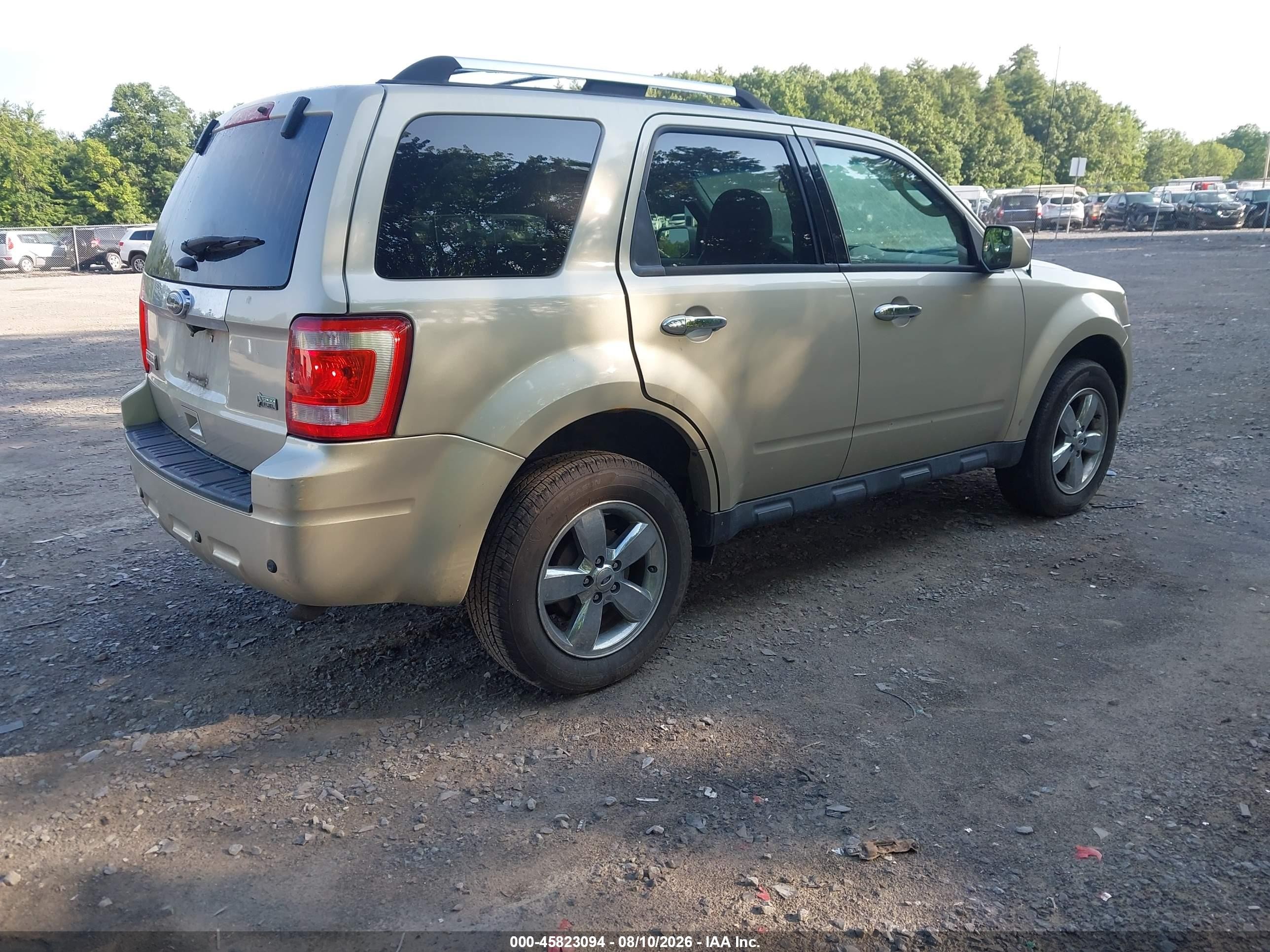 2011 Ford Escape Limited Gold vin: 1FMCU9EG0BKC15697
