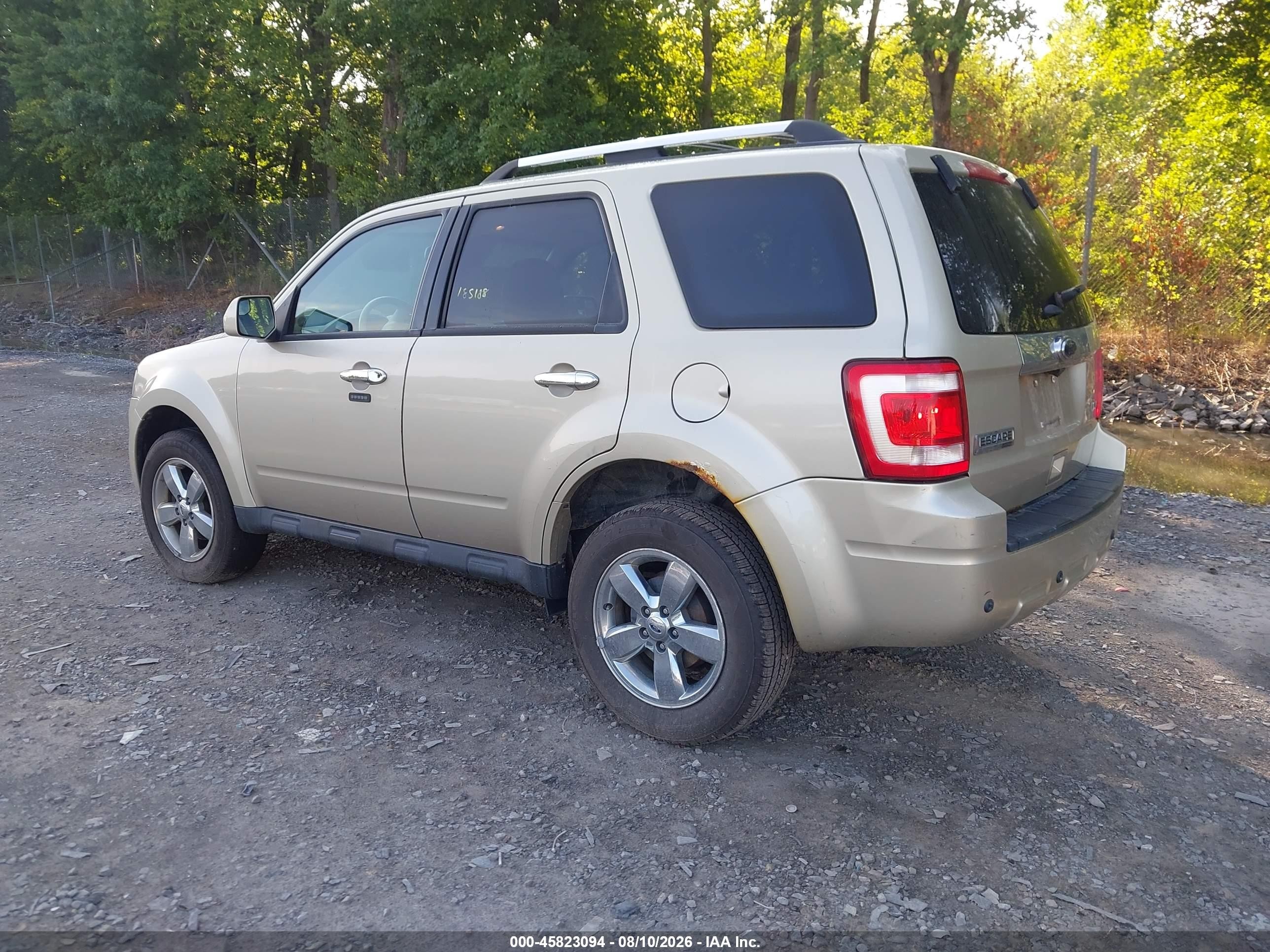 2011 Ford Escape Limited Gold vin: 1FMCU9EG0BKC15697