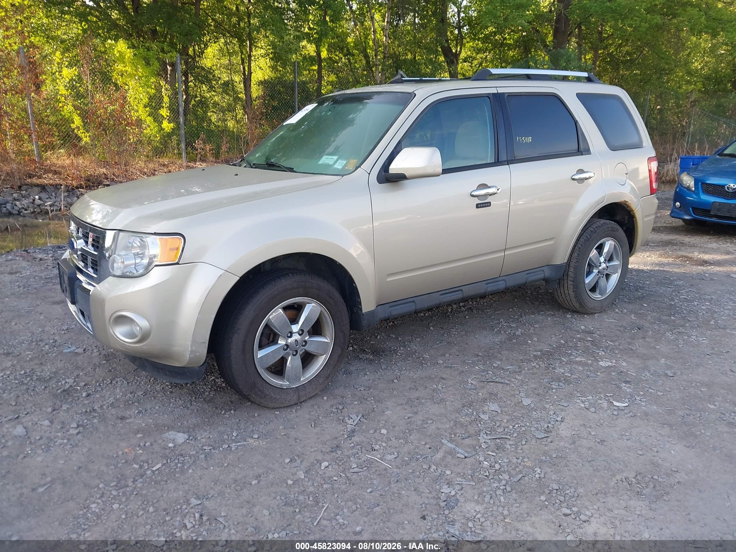 2011 Ford Escape Limited Gold vin: 1FMCU9EG0BKC15697