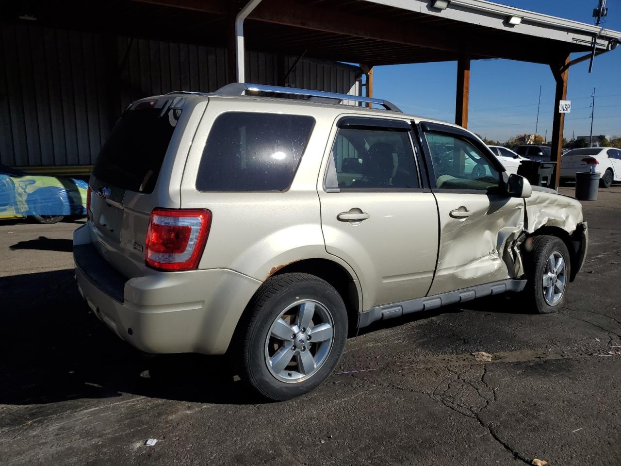 2011 Ford Escape Limited Gold vin: 1FMCU9EG2BKB20039