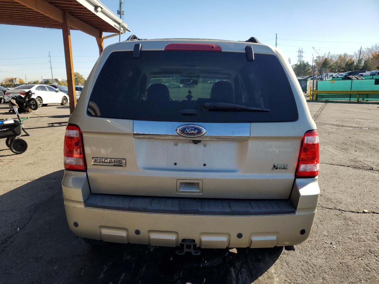 2011 Ford Escape Limited Gold vin: 1FMCU9EG2BKB20039