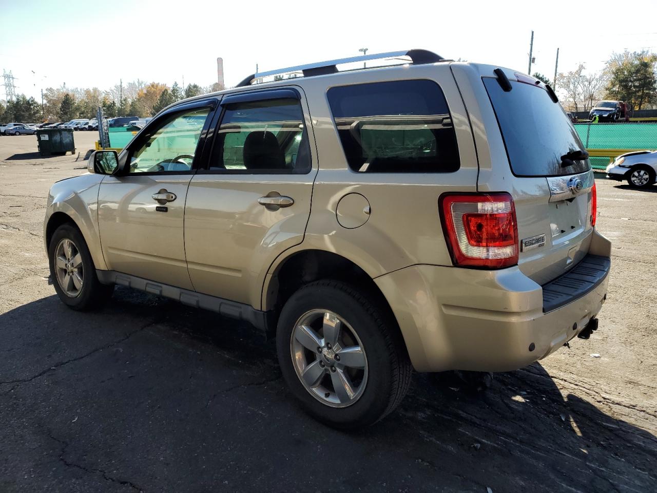 2011 Ford Escape Limited Gold vin: 1FMCU9EG2BKB20039
