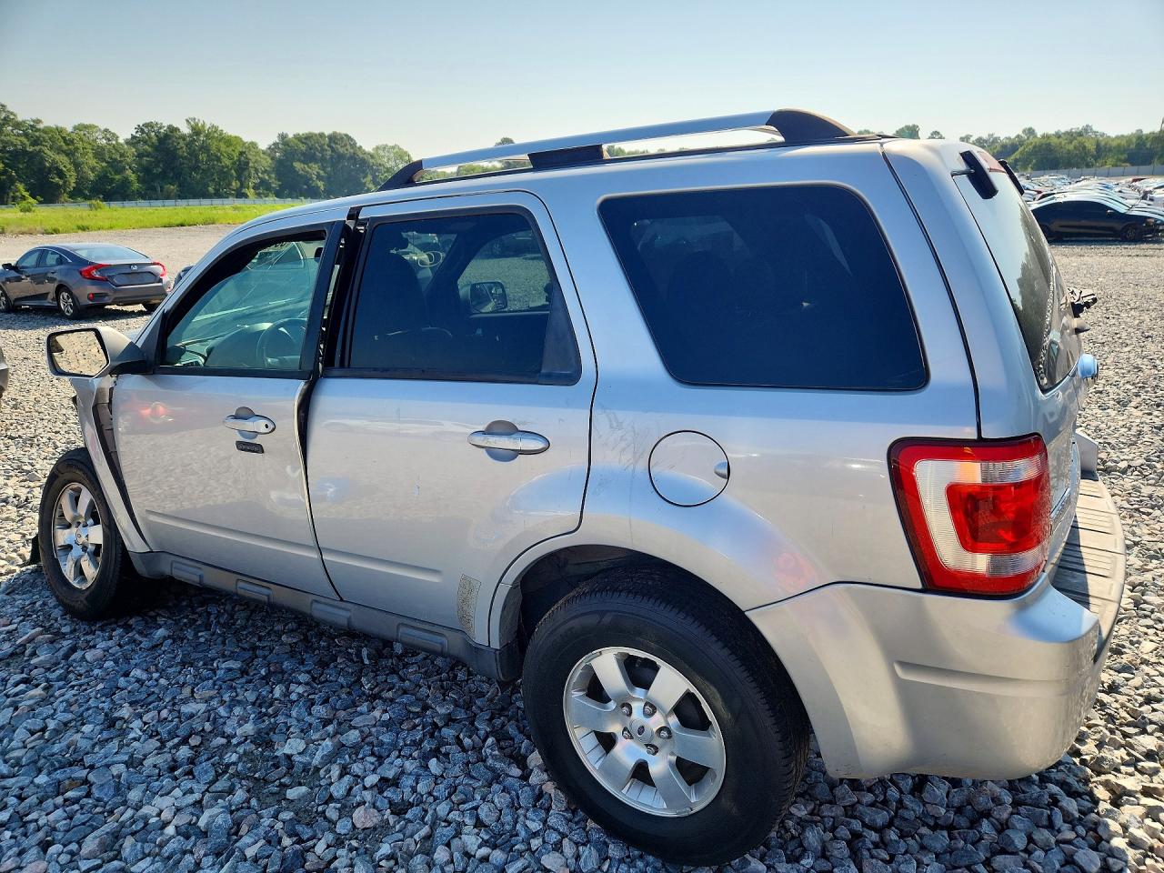 2012 Ford Escape Limited Серебряный vin: 1FMCU9EG3CKB70126
