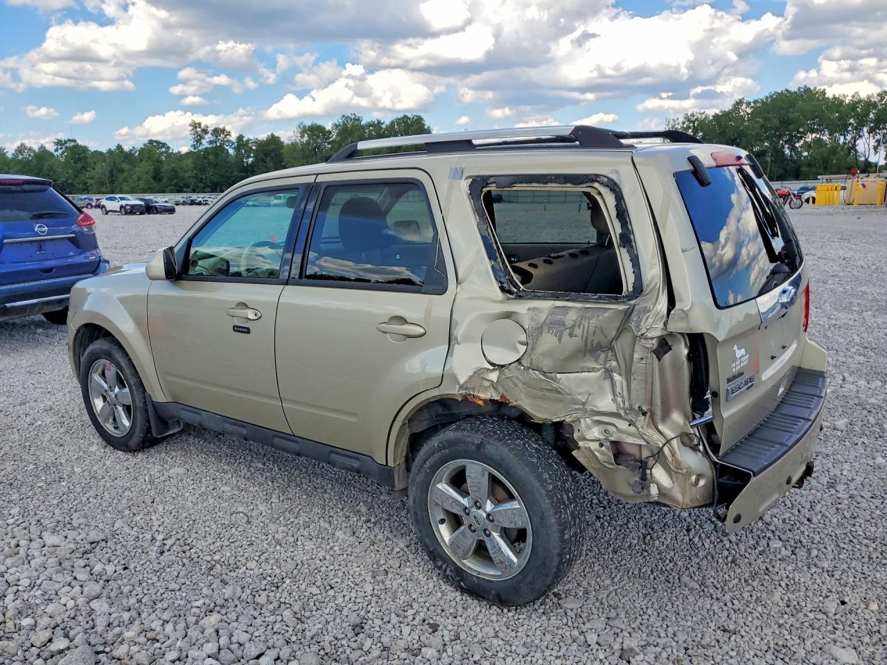 2011 Ford Escape Limited Золотой vin: 1FMCU9EG9BKB96390
