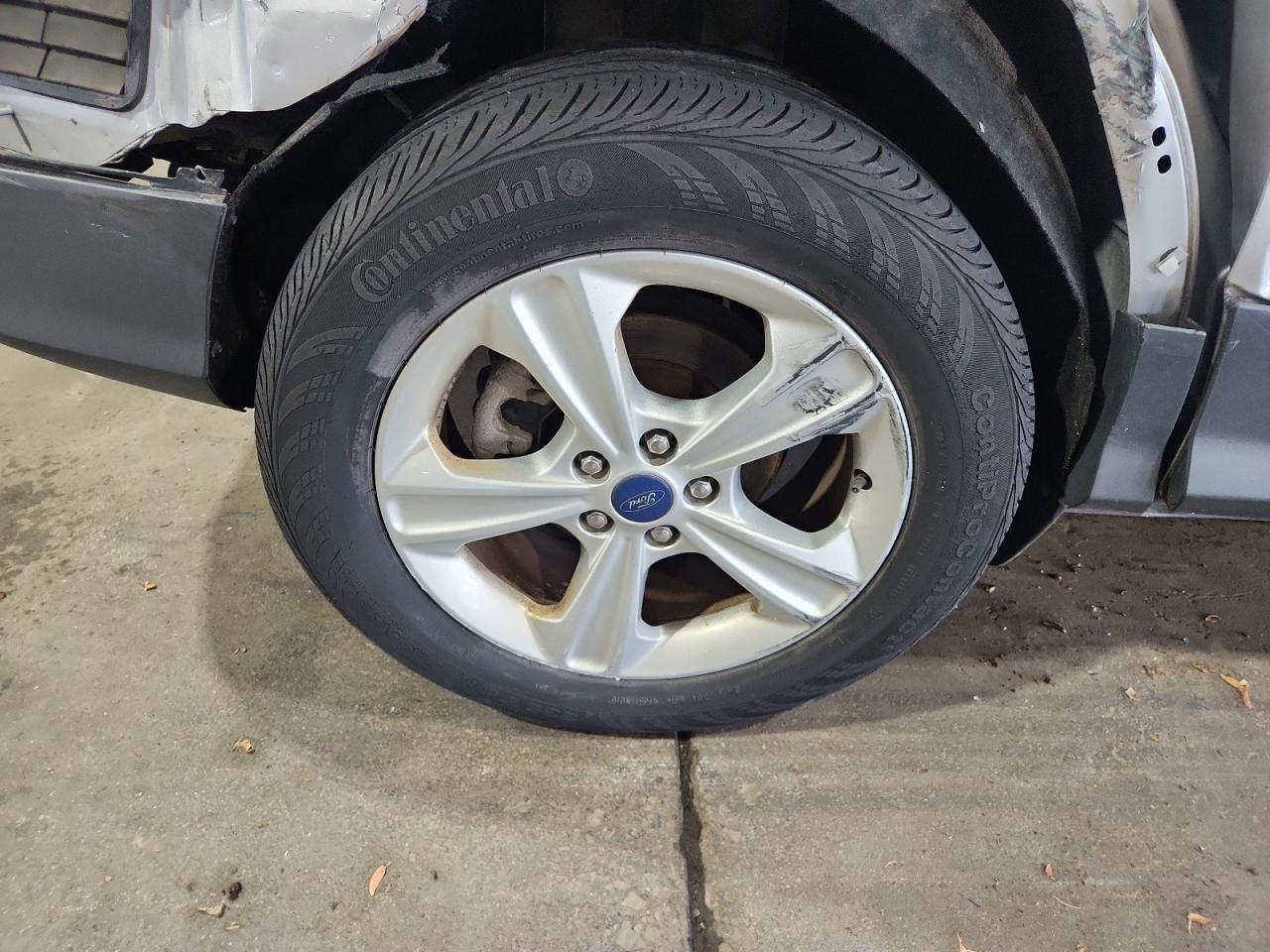 2015 Ford Escape Se Silver vin: 1FMCU9G94FUB91994 Damage: Right Rear Wheel, Curb Rash, > 12 Inches