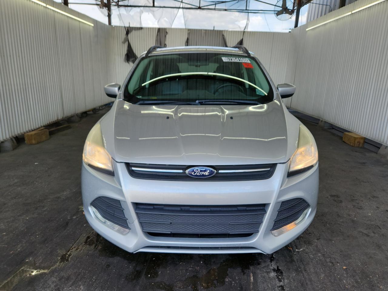 2014 Ford Escape Se Silver vin: 1FMCU9GX0EUD57604 Damage: Left Head Lamp, Faded, Repair Required