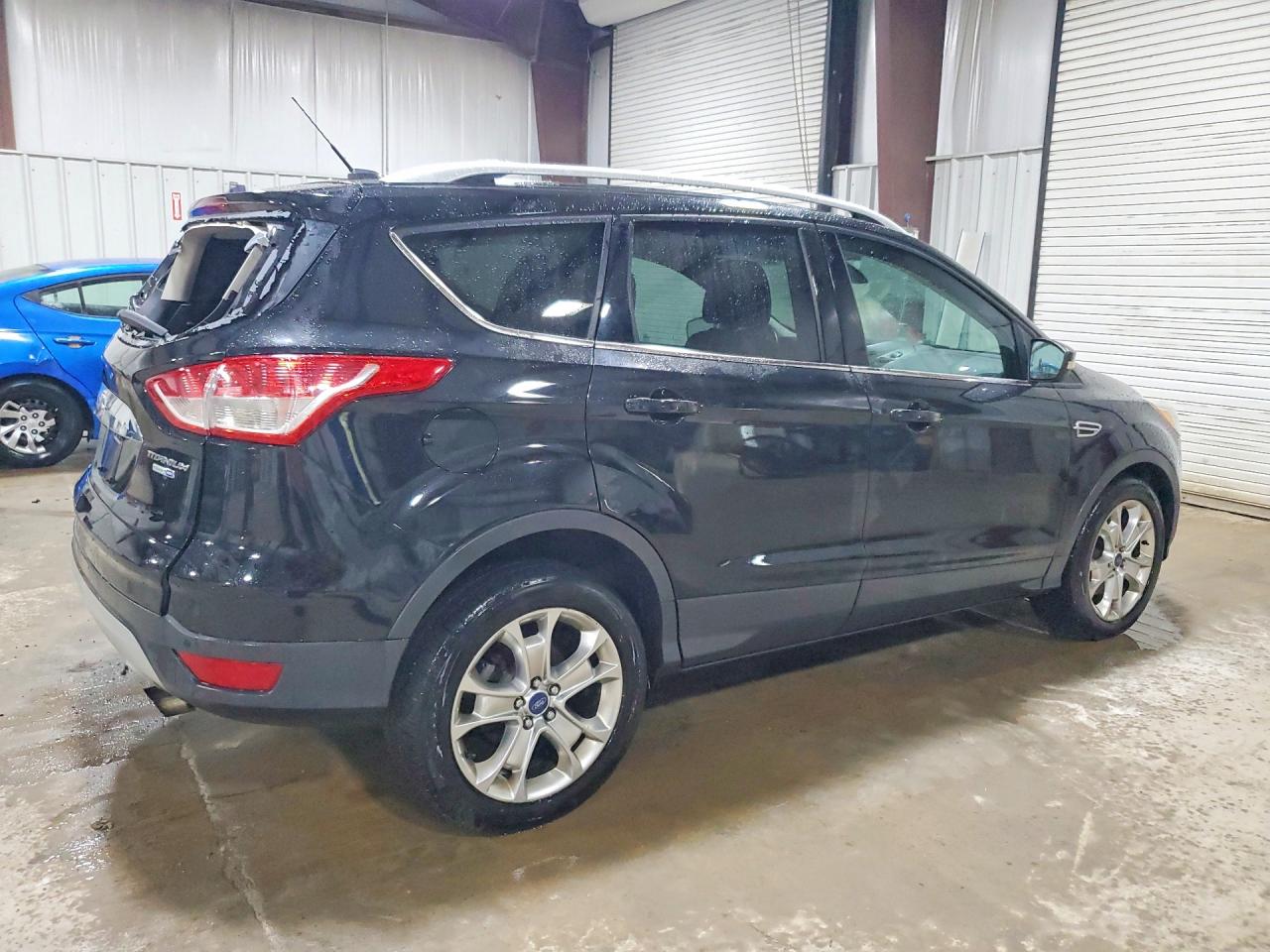 2014 Ford Escape Titanium Black vin: 1FMCU9J90EUA65543