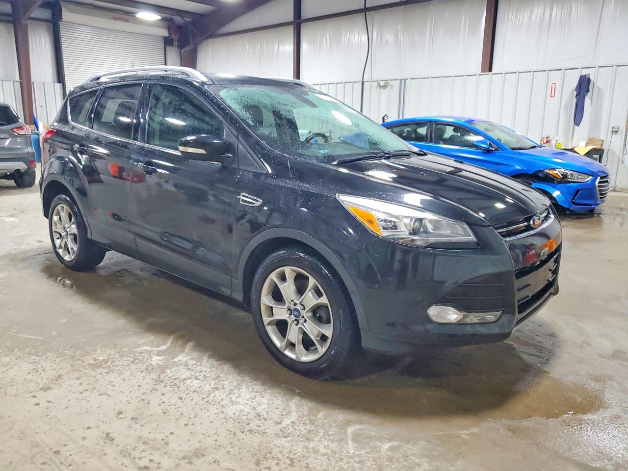 2014 Ford Escape Titanium Black vin: 1FMCU9J90EUA65543
