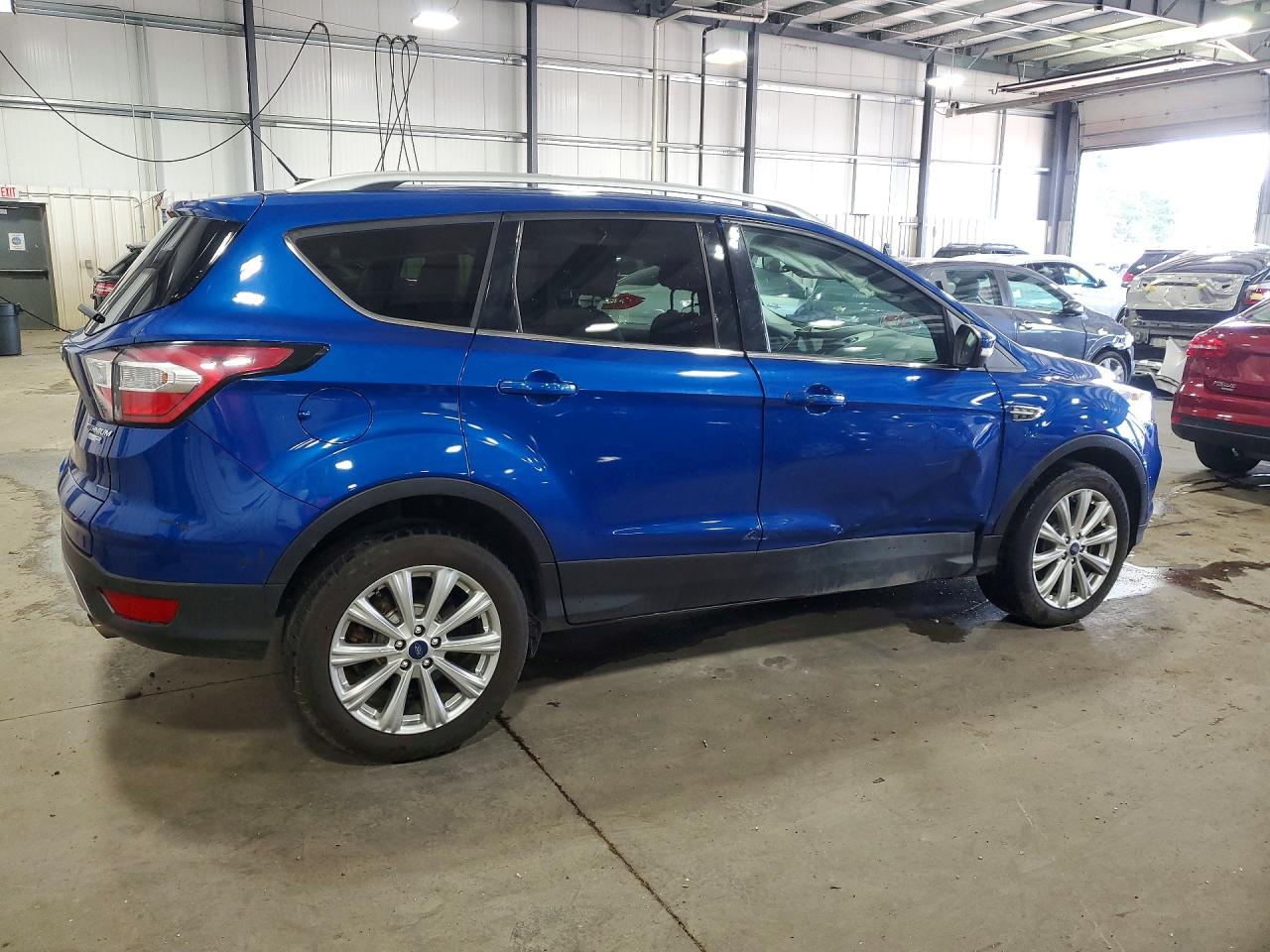 2017 Ford Escape Titanium Blue vin: 1FMCU9J90HUD00138