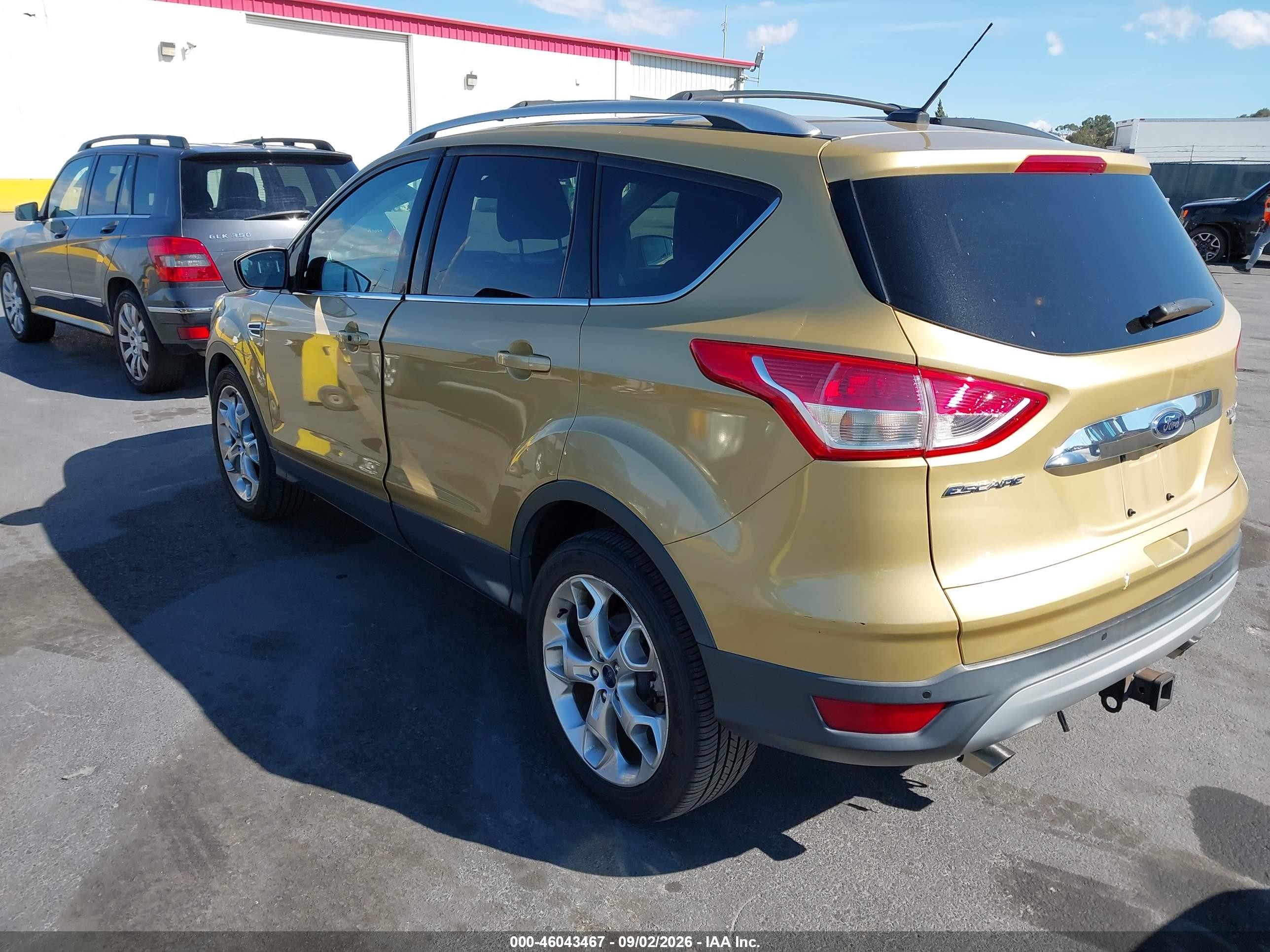 2014 Ford Escape Titanium Gold vin: 1FMCU9J91EUB99655