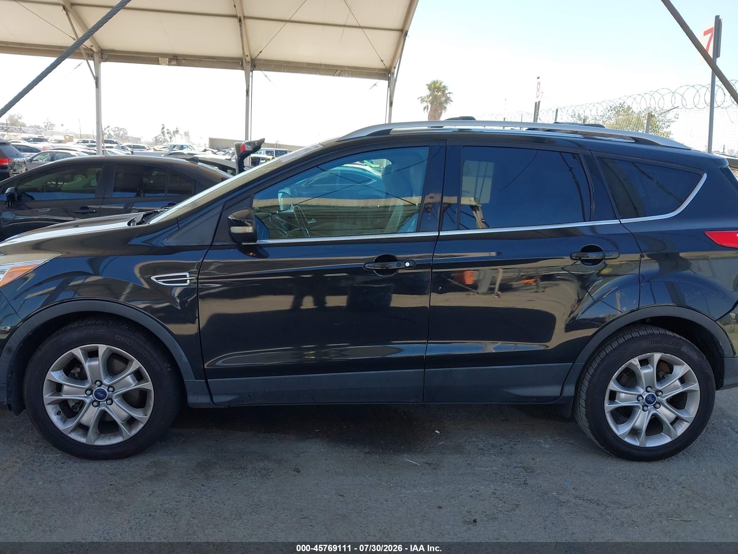 2014 Ford Escape Titanium Black vin: 1FMCU9J92EUB64493