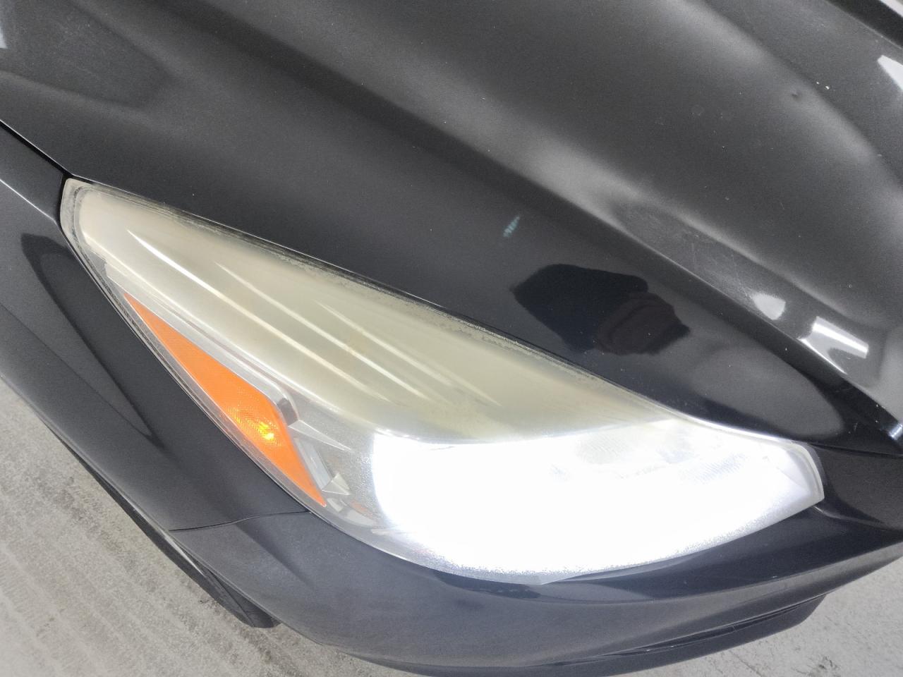 2014 Ford Escape Titanium Black vin: 1FMCU9J93EUA07796 Damage: Right Head Lamp, Faded, Repair Required