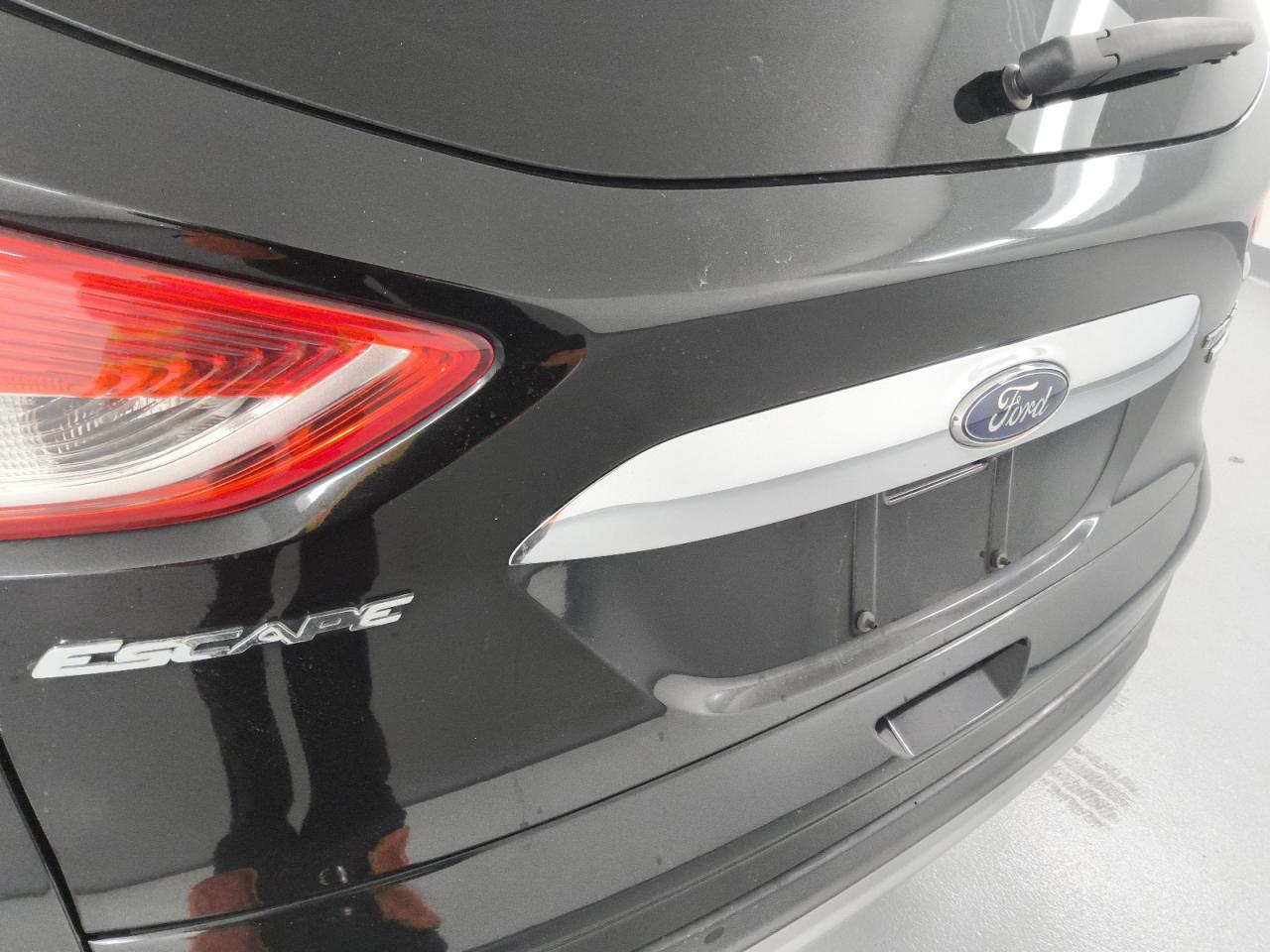 2014 Ford Escape Titanium Black vin: 1FMCU9J93EUA07796 Damage: Lift Gate, Chipped, 3